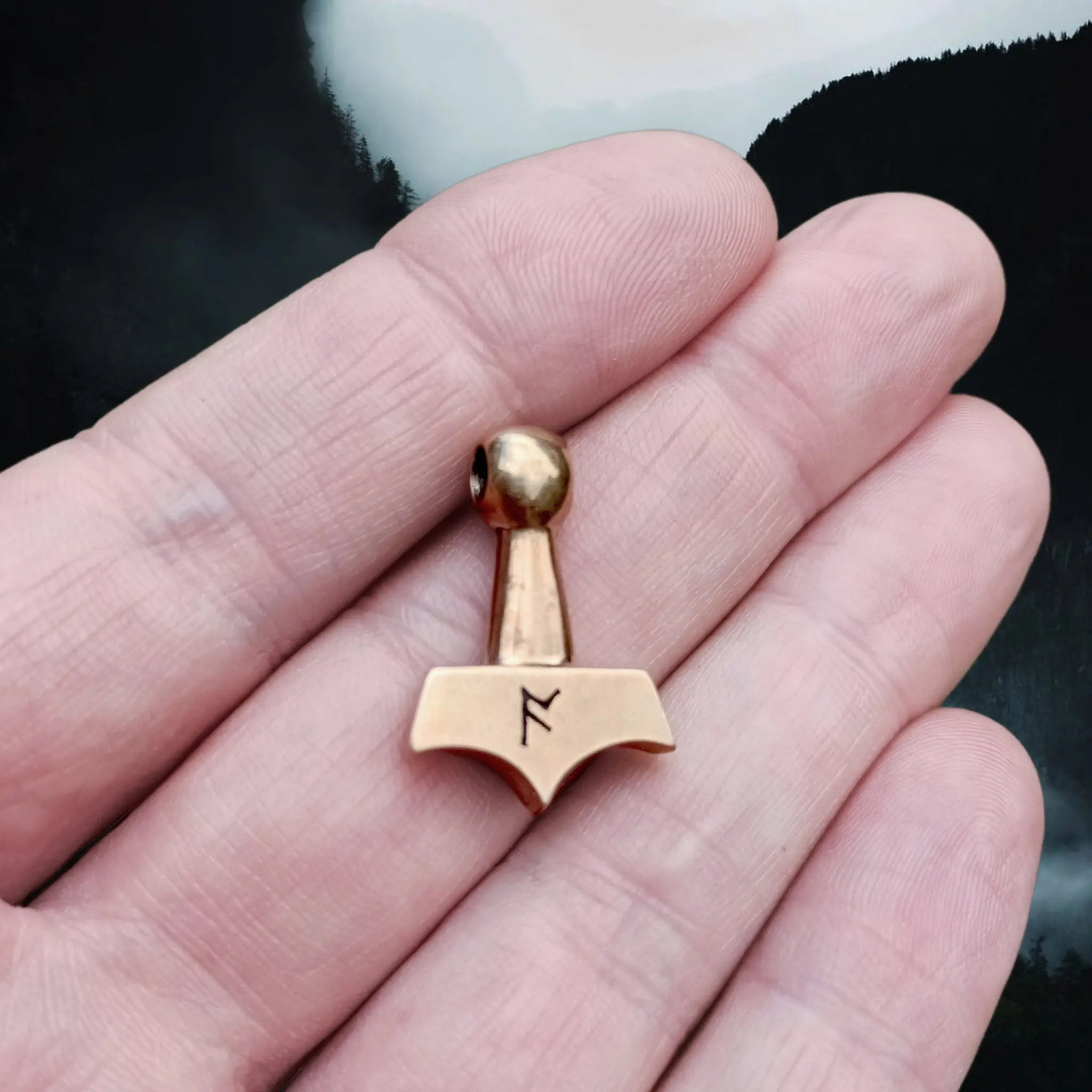 Small Bronze Knotwork Thors Hammer Pendant on Hand - Back View