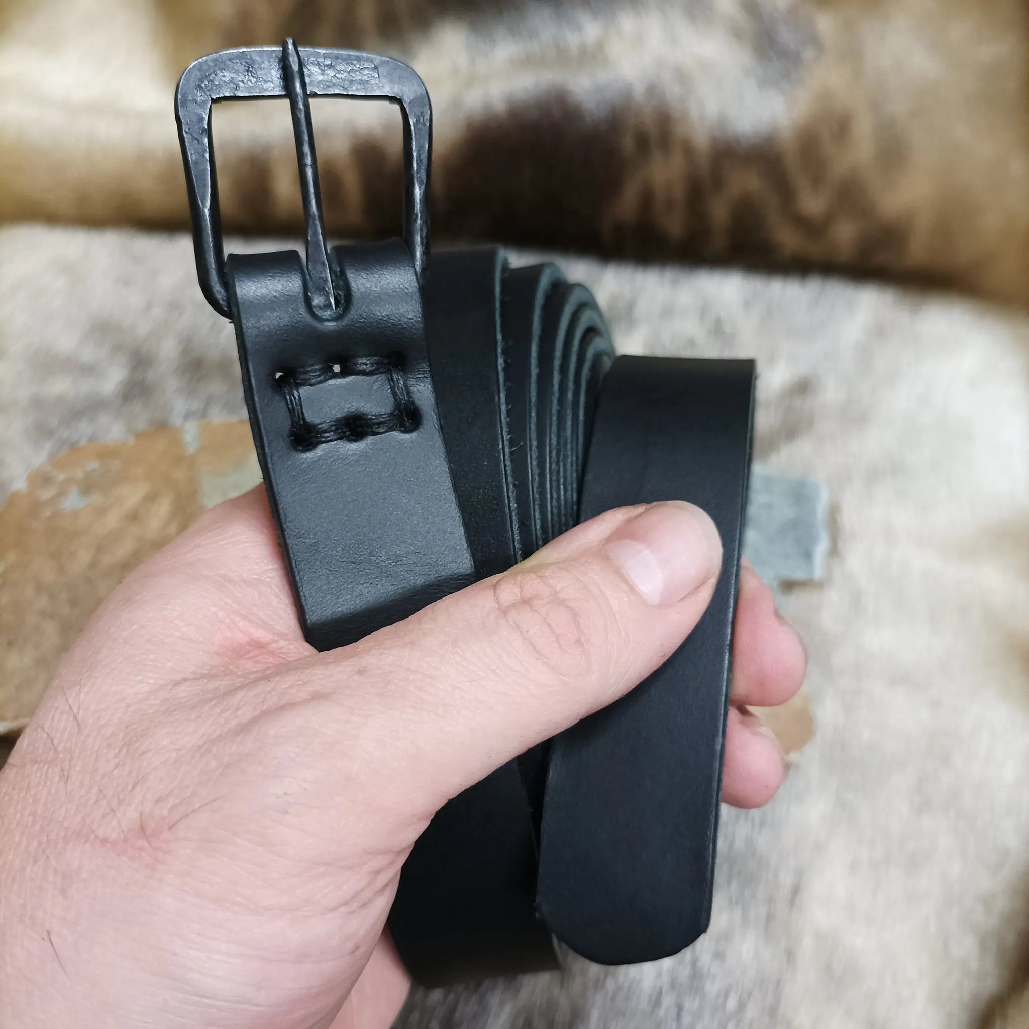 Complete Long Black Leather Viking Belt with Hand-Forged Rectangular Shaped Iron Buckle in Hand