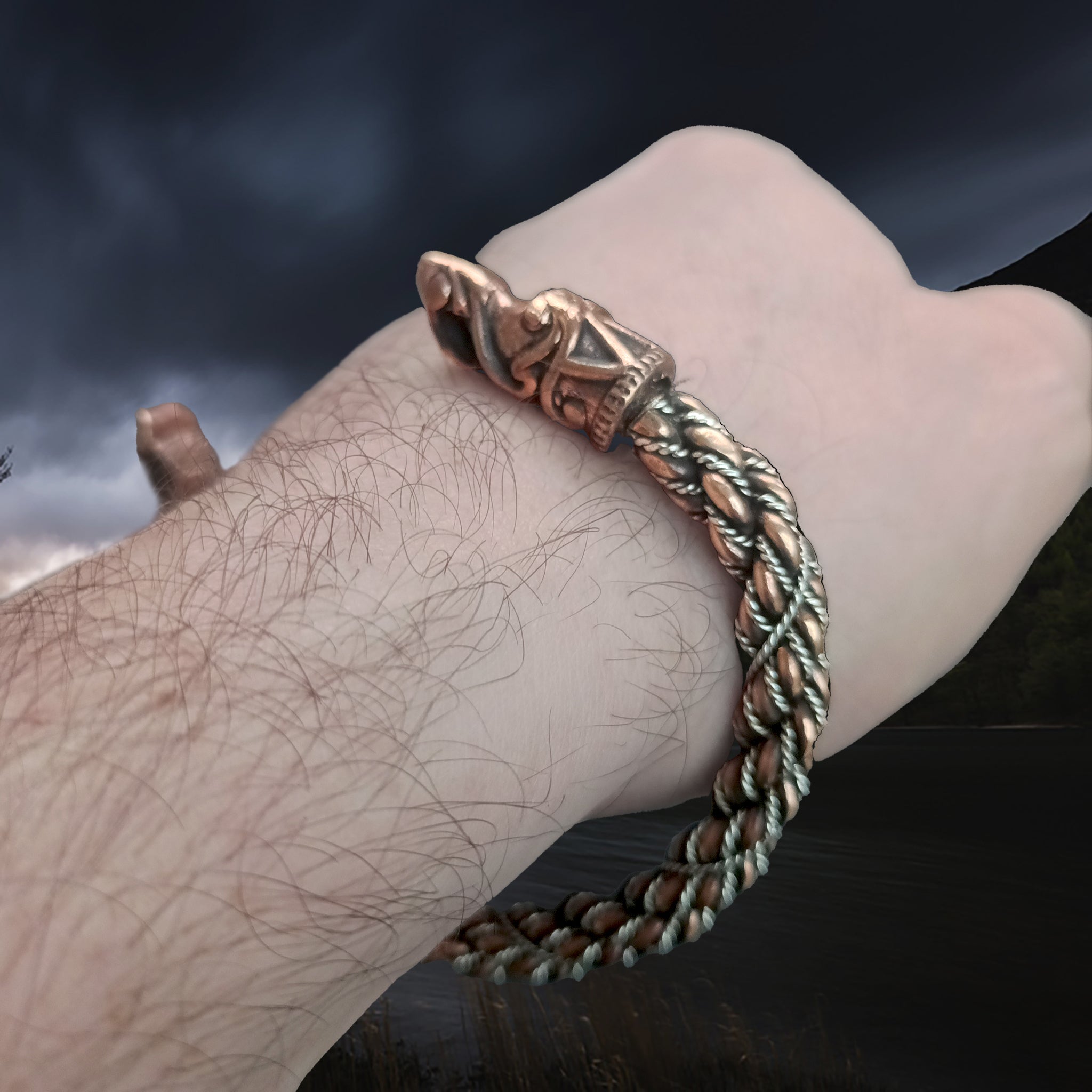Handmade Twisted Bronze and Silver Arm Ring / Bracelet With Gotlandic Dragon Heads om Wrist