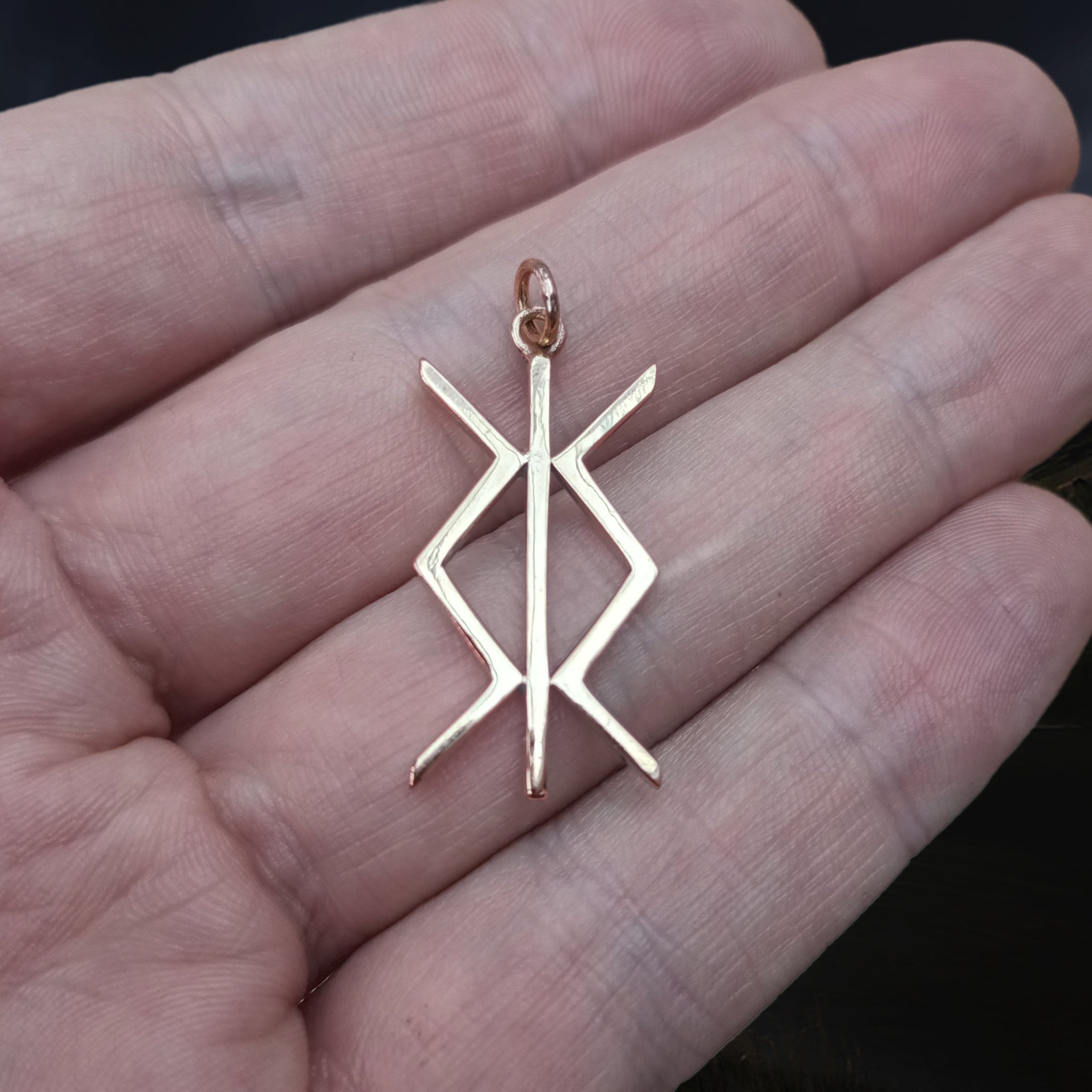 Protection Bind Rune Viking Pendant in Solid Bronze on Hand