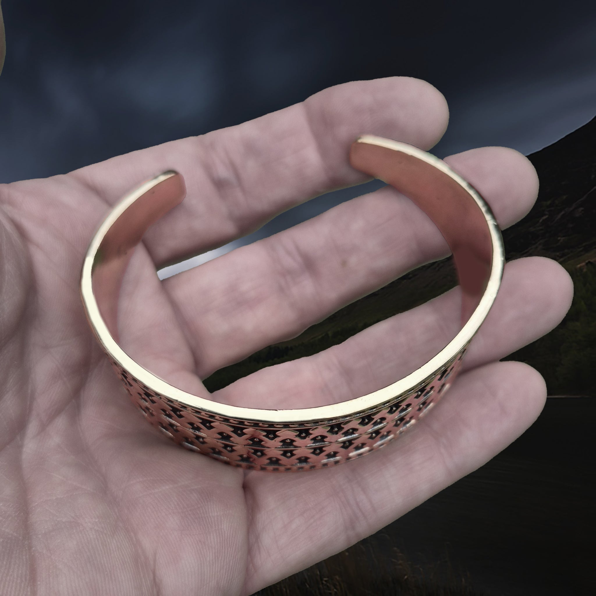 Bronze Hiberno-Norse Viking Bracelet / Arm Ring Replica with 1 Dot Design on Hand - Above Angle View