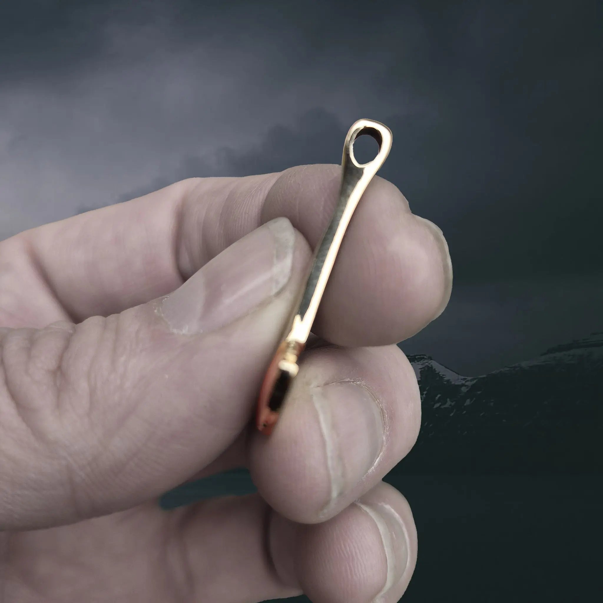 Bronze Replica Thor's Hammer Pendant from Repton, England, UK in Fingers - Side View