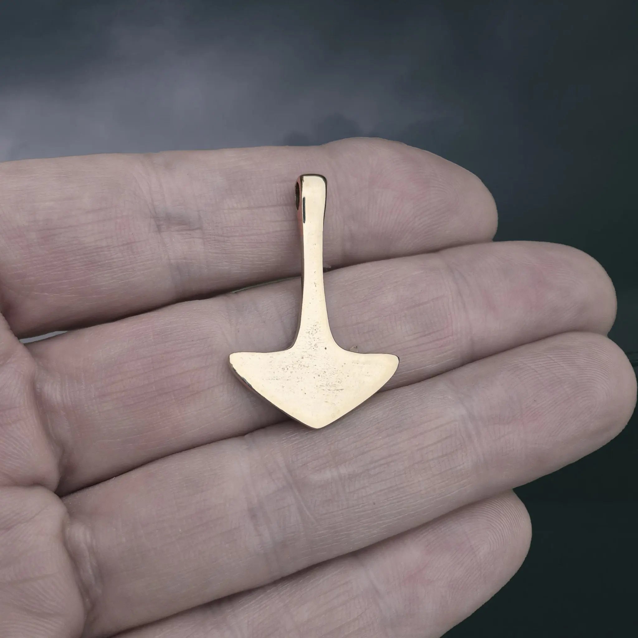 Bronze Replica Thor's Hammer Pendant from Repton, England, UK on Hand