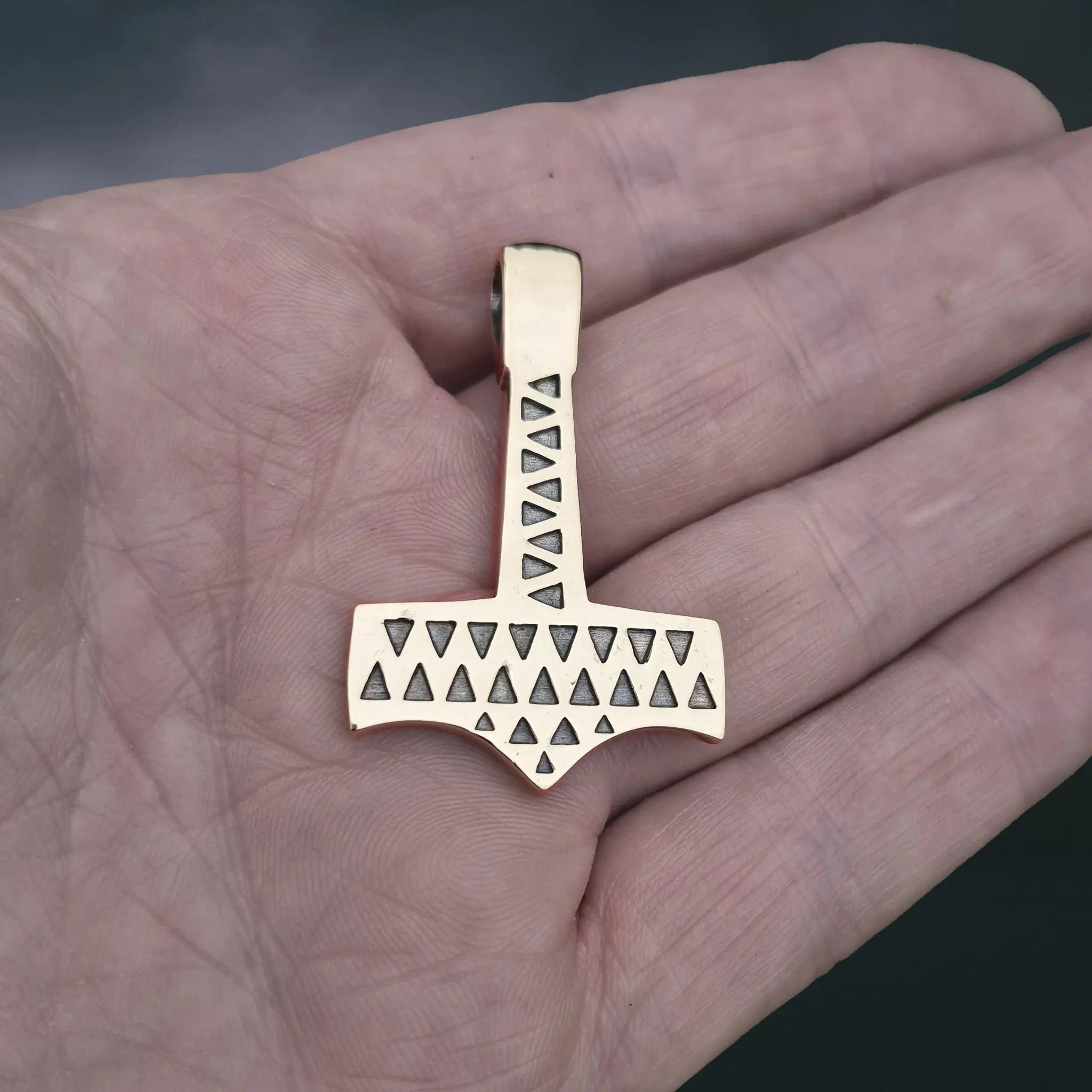 Bronze Thors Hammer Pendant Replica from Vålse, Denmark on Hand