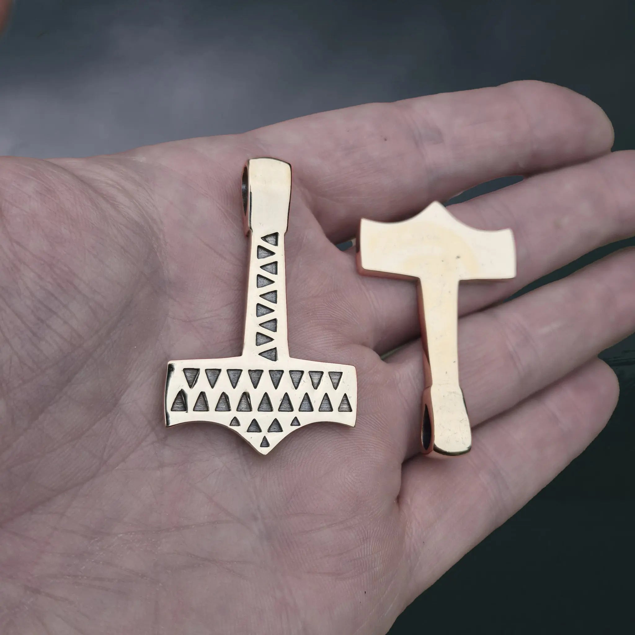 Bronze Thors Hammer Pendant Replicas from Vålse, Denmark on Hand - Front and Back View