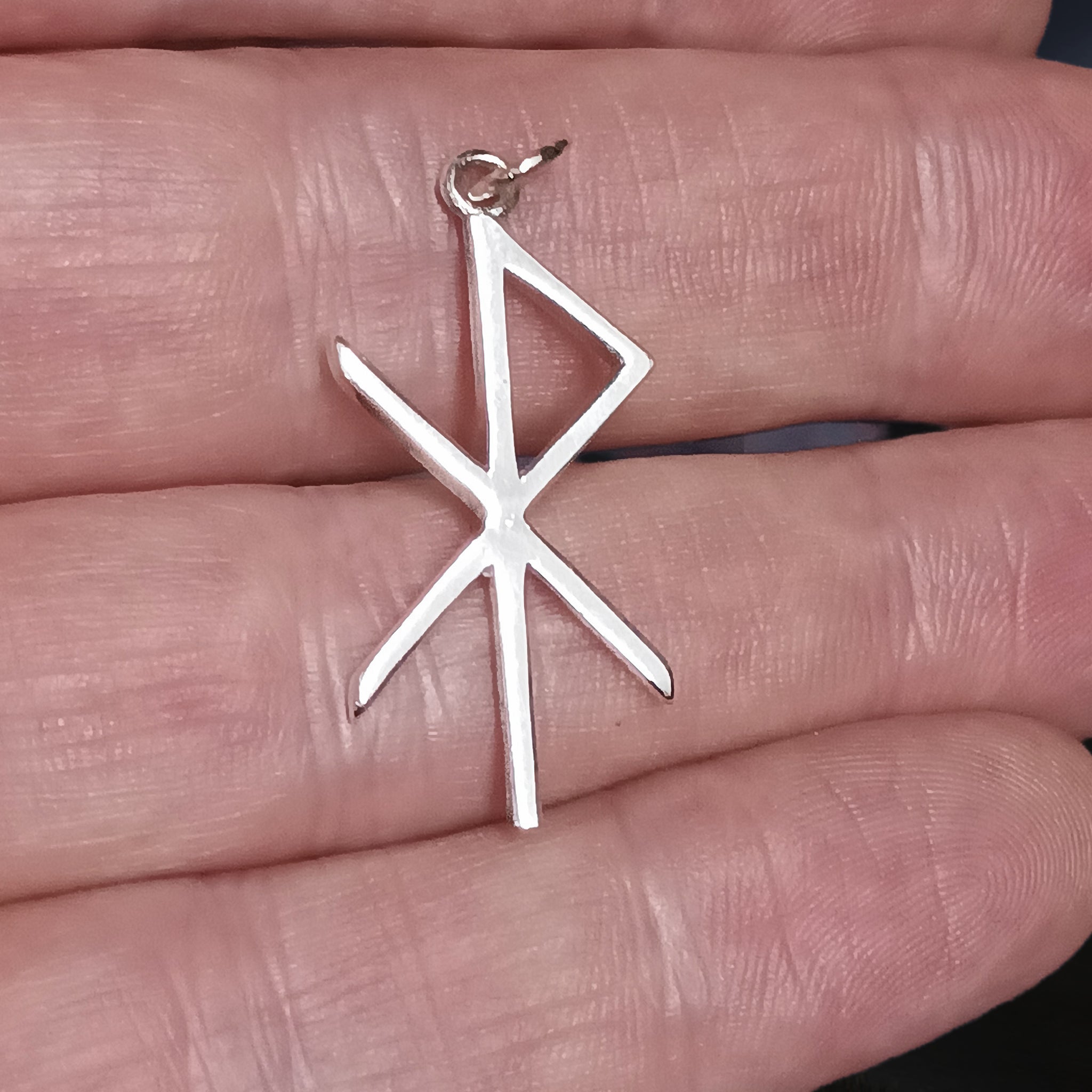 Silver Love Bind Rune Viking Pendant on Hand