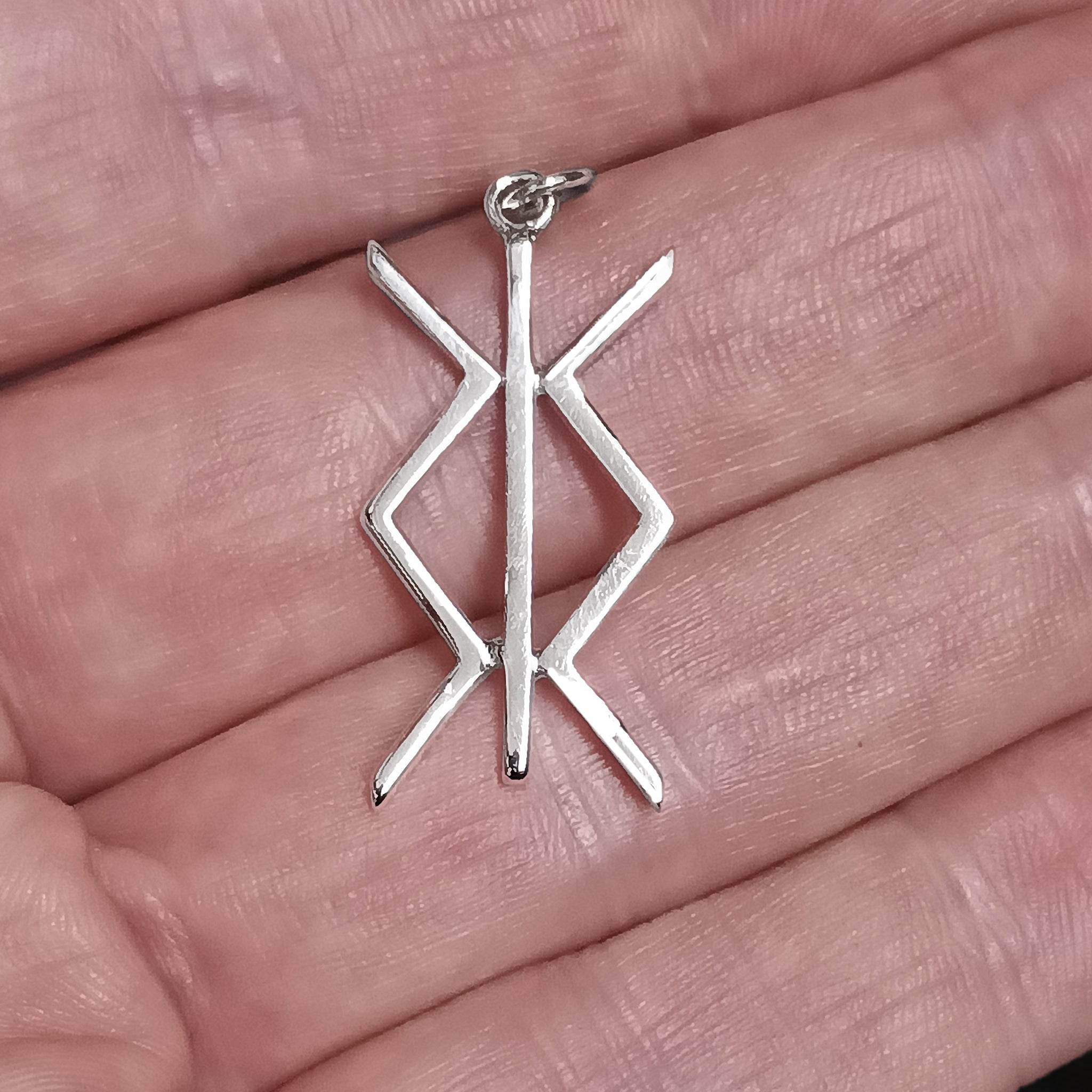 Silver Protection Bind Rune Viking Pendant on Hand