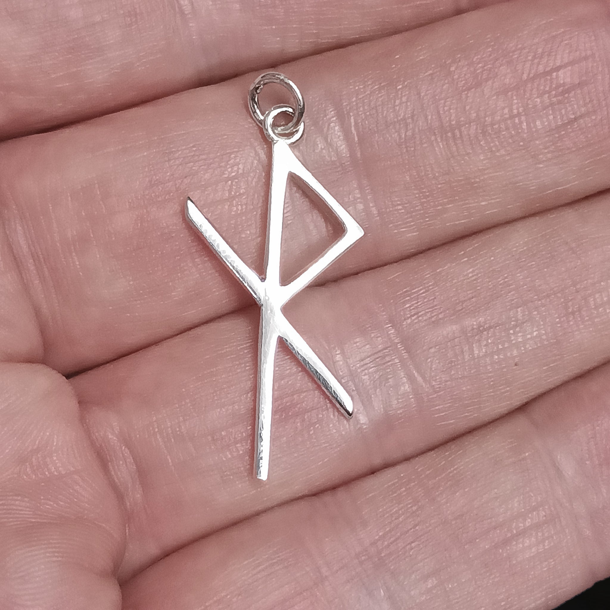 Silver Safe Travel Bind Rune Viking Pendant on Hand