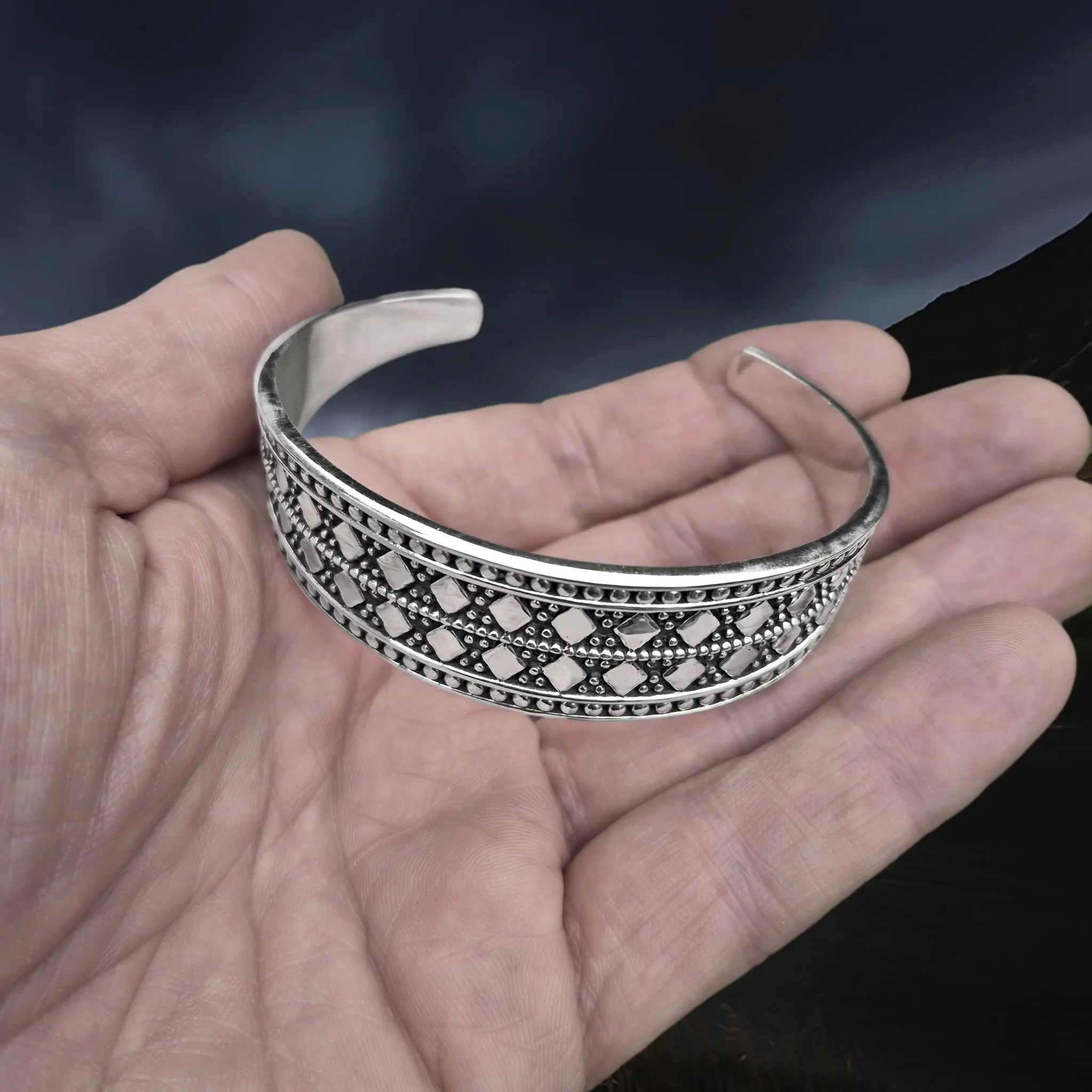 Silver Viking Bracelet / Arm Ring Replica From Anglesey with 5 Dot Design on Hand - Front Angle View