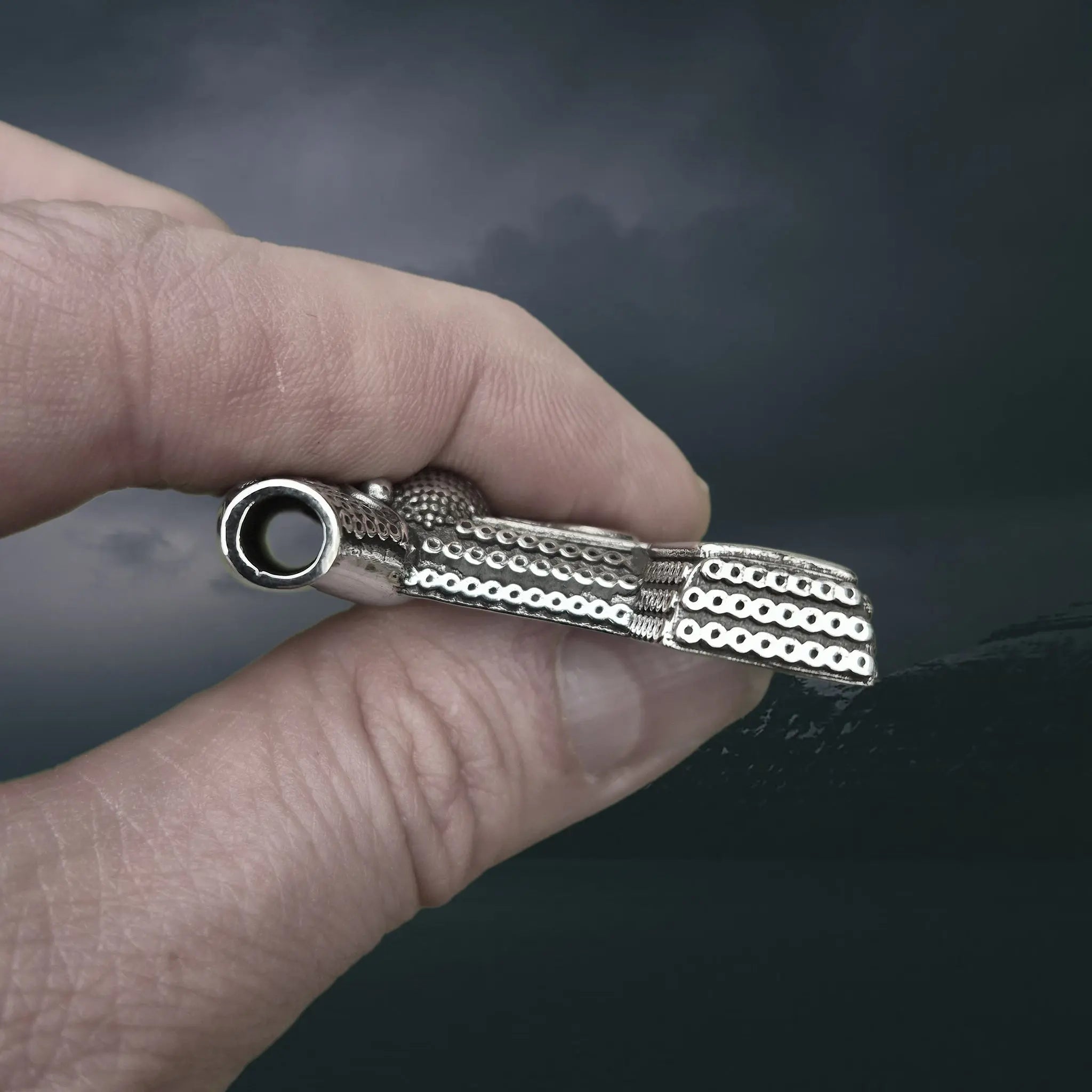 Large Silver Skåne Thors Hammer Pendant Replica in Fingers - Side View