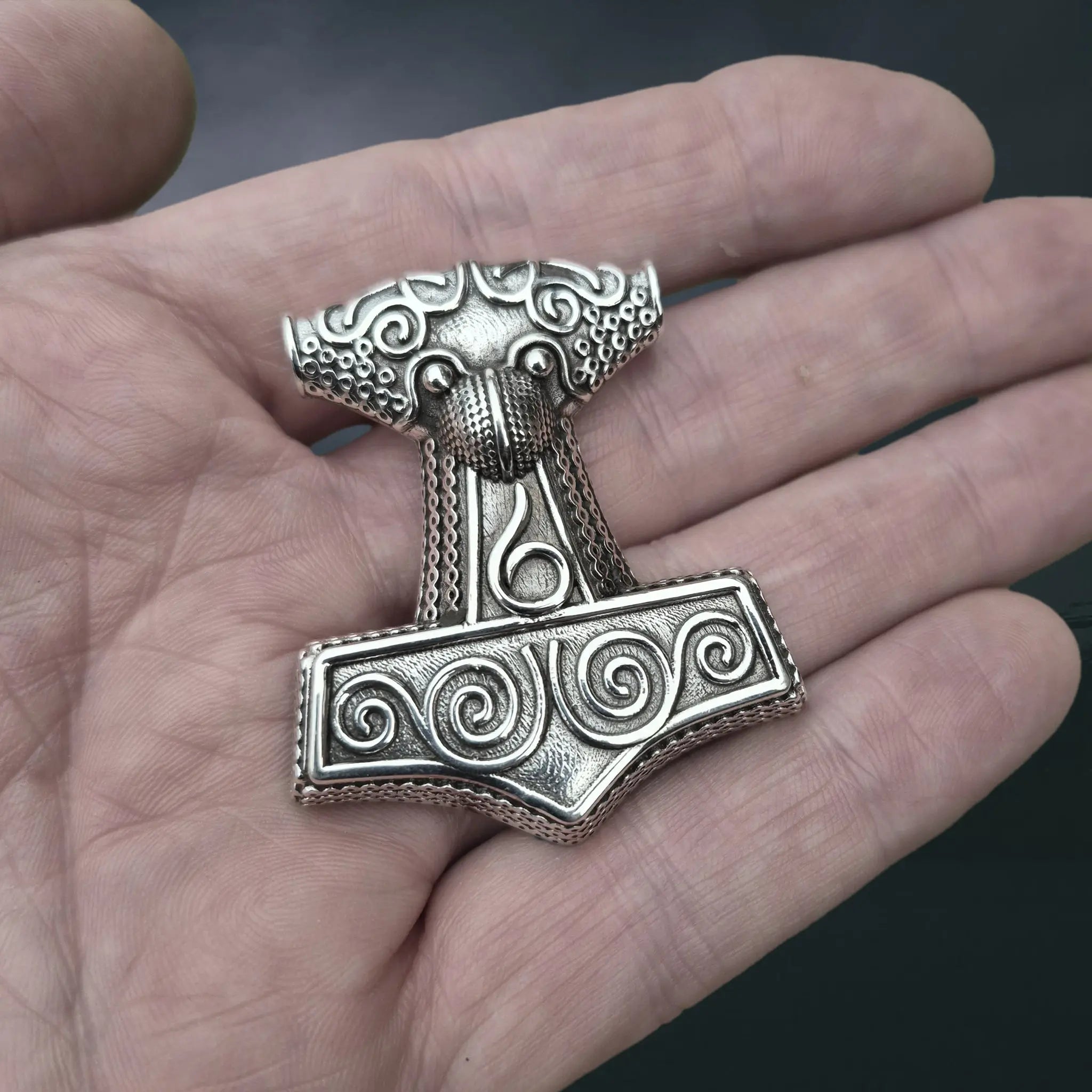 Large Silver Skåne Thor's Hammer Pendant Replica on Hand