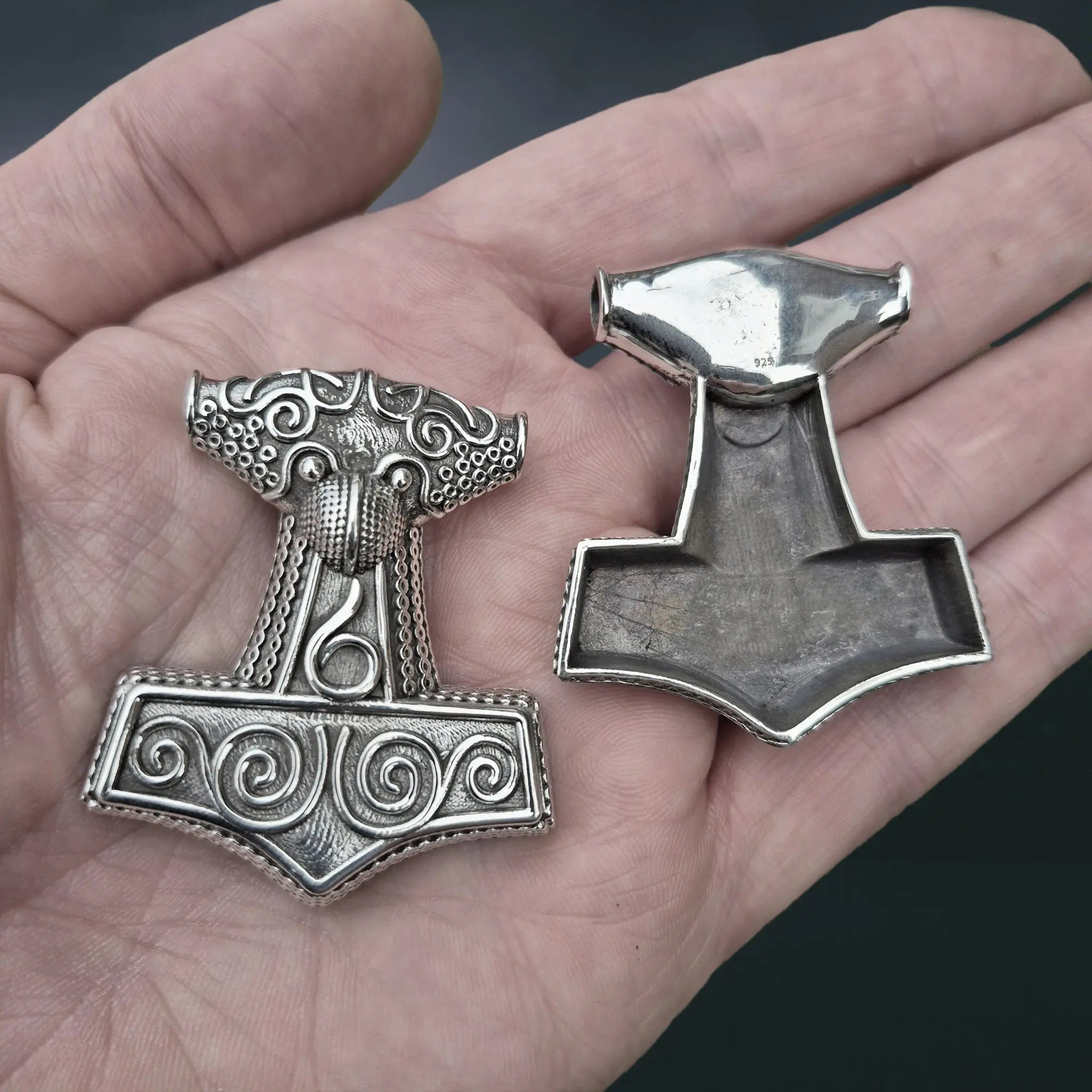 Large Silver Skåne Thor's Hammer Pendant Replicas on Hand - Front and Back View