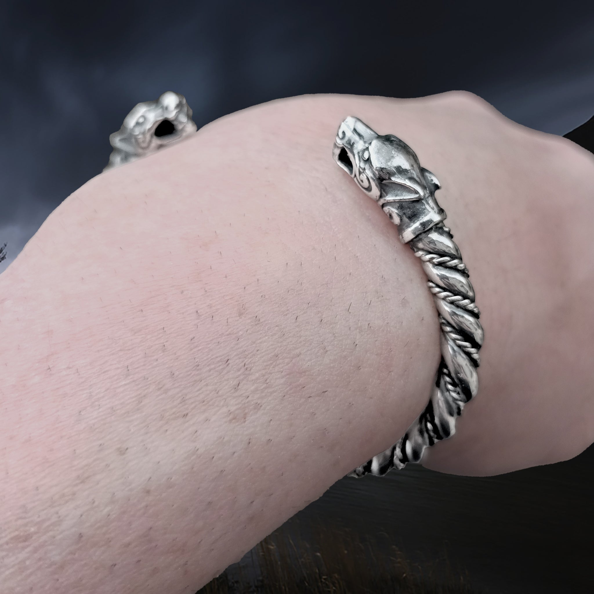 Twisted Silver Viking Bracelet / Arm Ring With Ferocious Wolf Heads on Wrist - Close Up Angle View