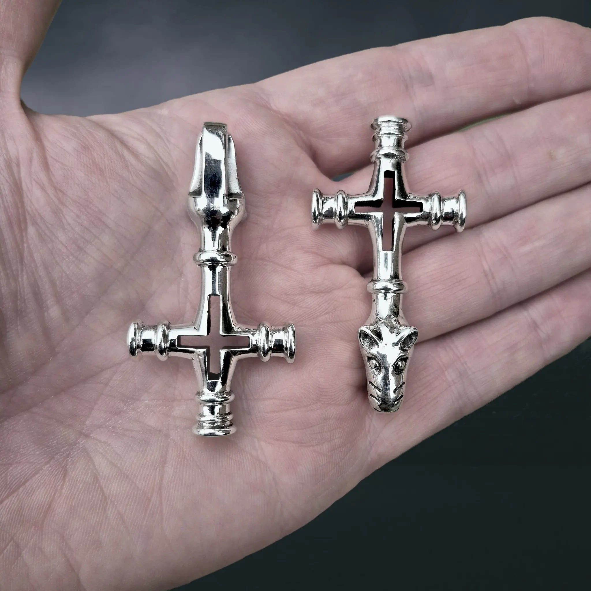 Large Silver Icelandic Wolf Cross Hammer Replica Pendants on Hand - Front & Back View