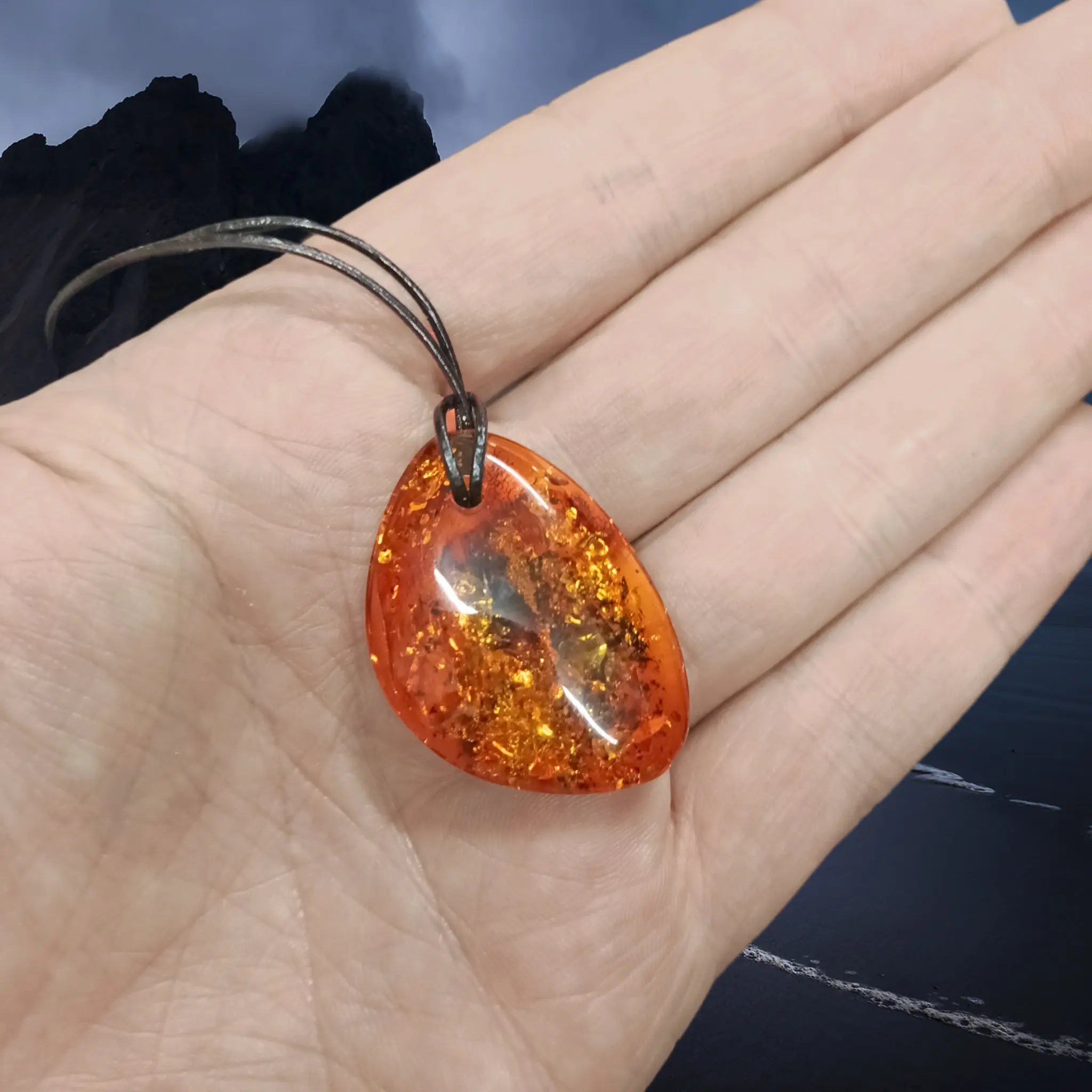 Large Amber Amulet Pendant on Leather Thong - On Hand