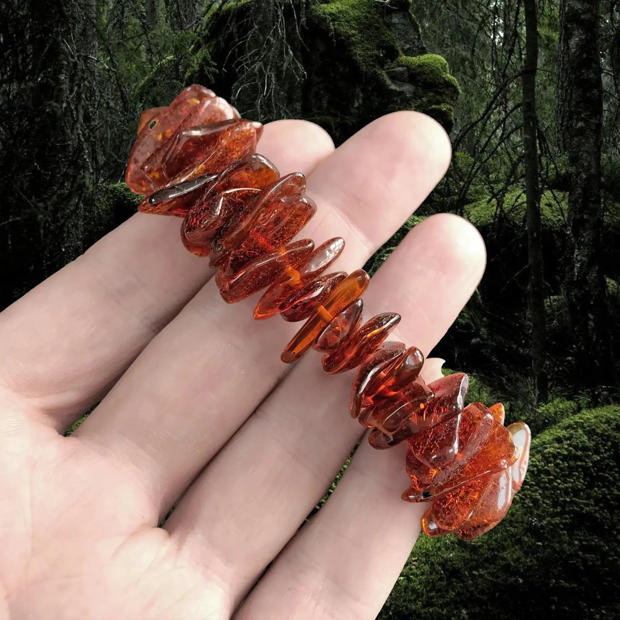 Amber Viking Bracelet Made From Cut and Polished Large Amber Chips - Placed on Fingers for Display