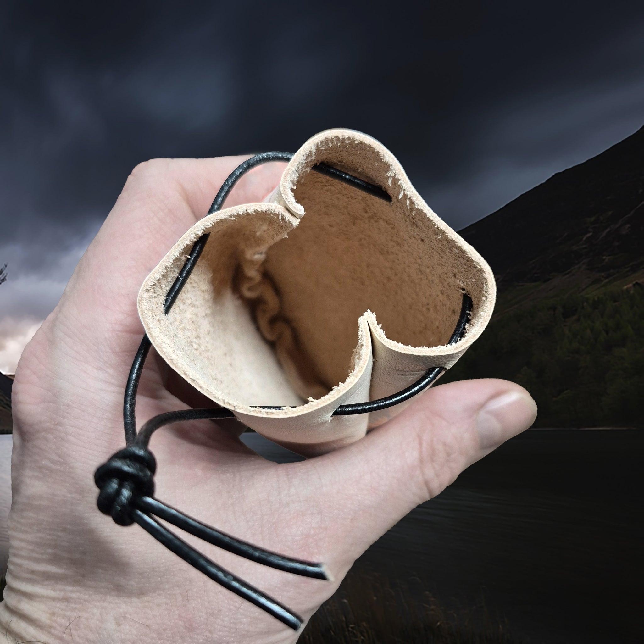 Natural Veg-Tan Leather Viking Pouch with Leather Drawstring Tie in Hand - Inside View