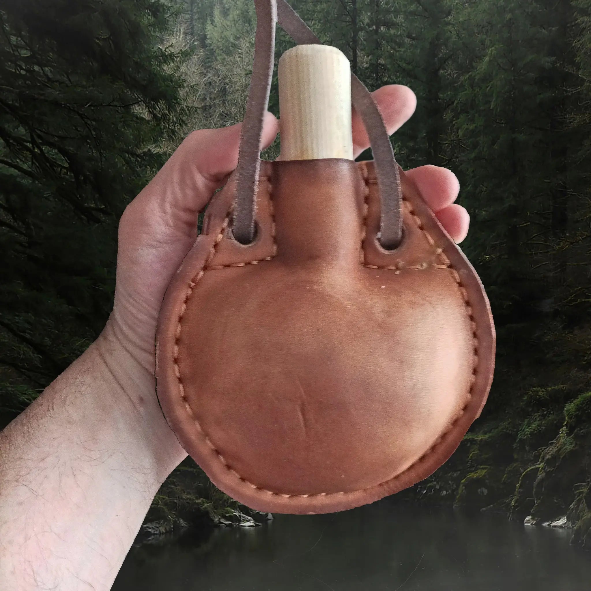 Handmade Thick Leather Water Bottle with Wood Stopper & Brown Leather Cord Carry Strap in Hand for Scale
