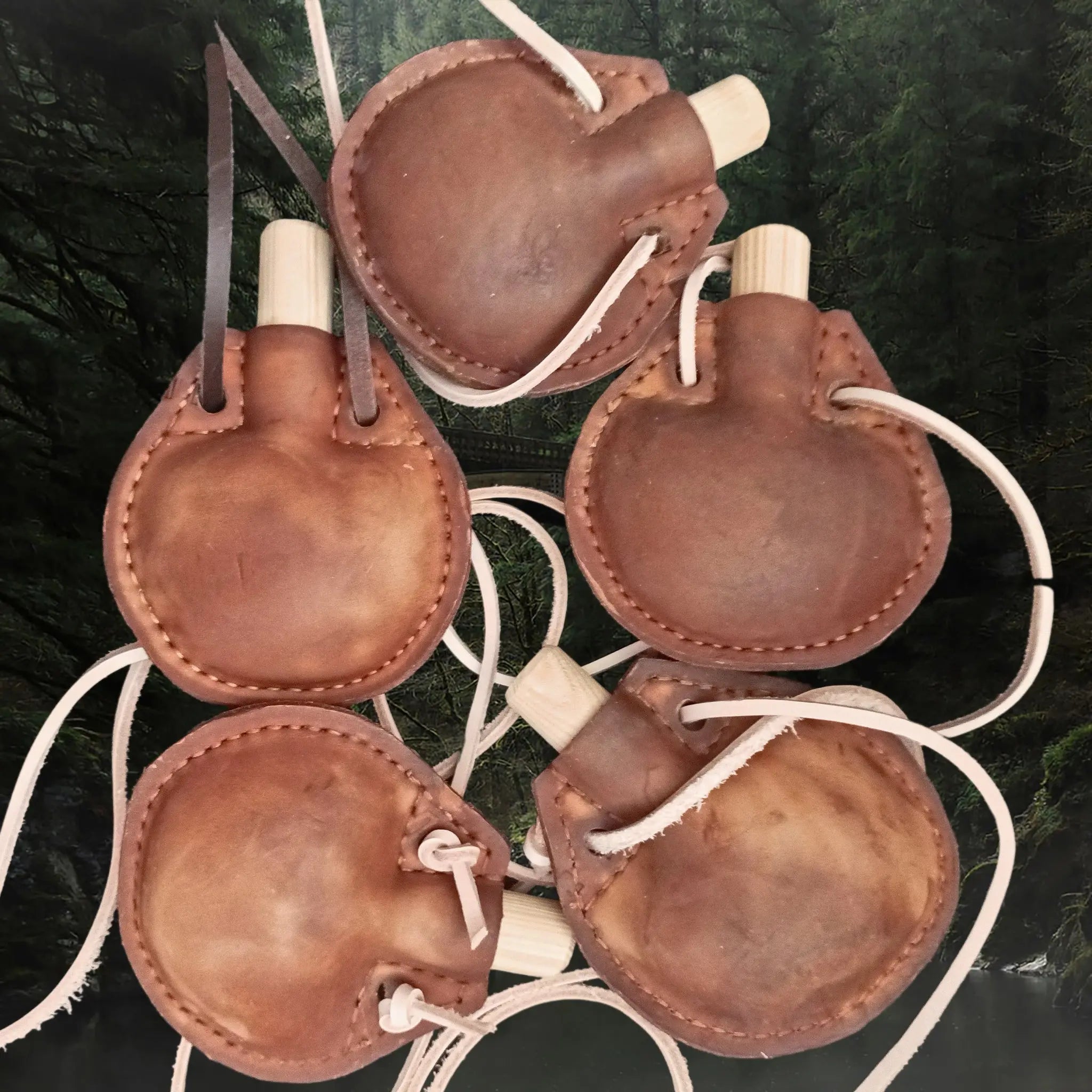 Handmade Thick Leather Water Bottles with Wood Stoppers & Leather Cord Carry Straps Examples