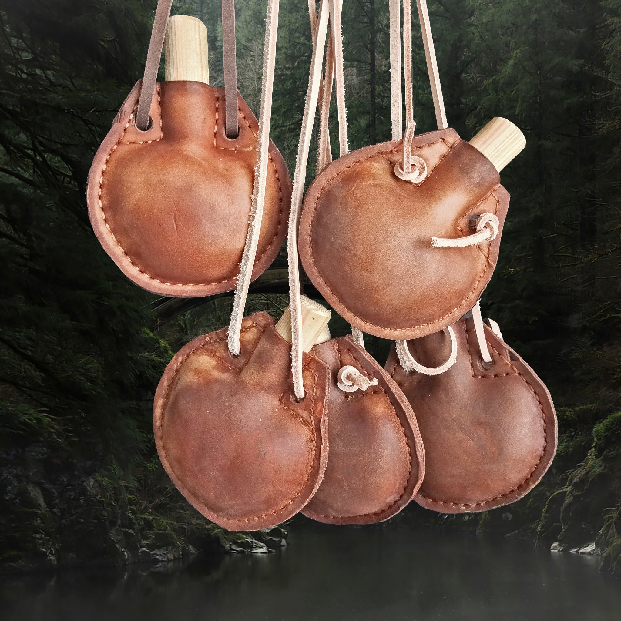 Handmade Thick Leather Water Bottles with Wood Stoppers & Leather Cord Carry Straps - Hung Up
