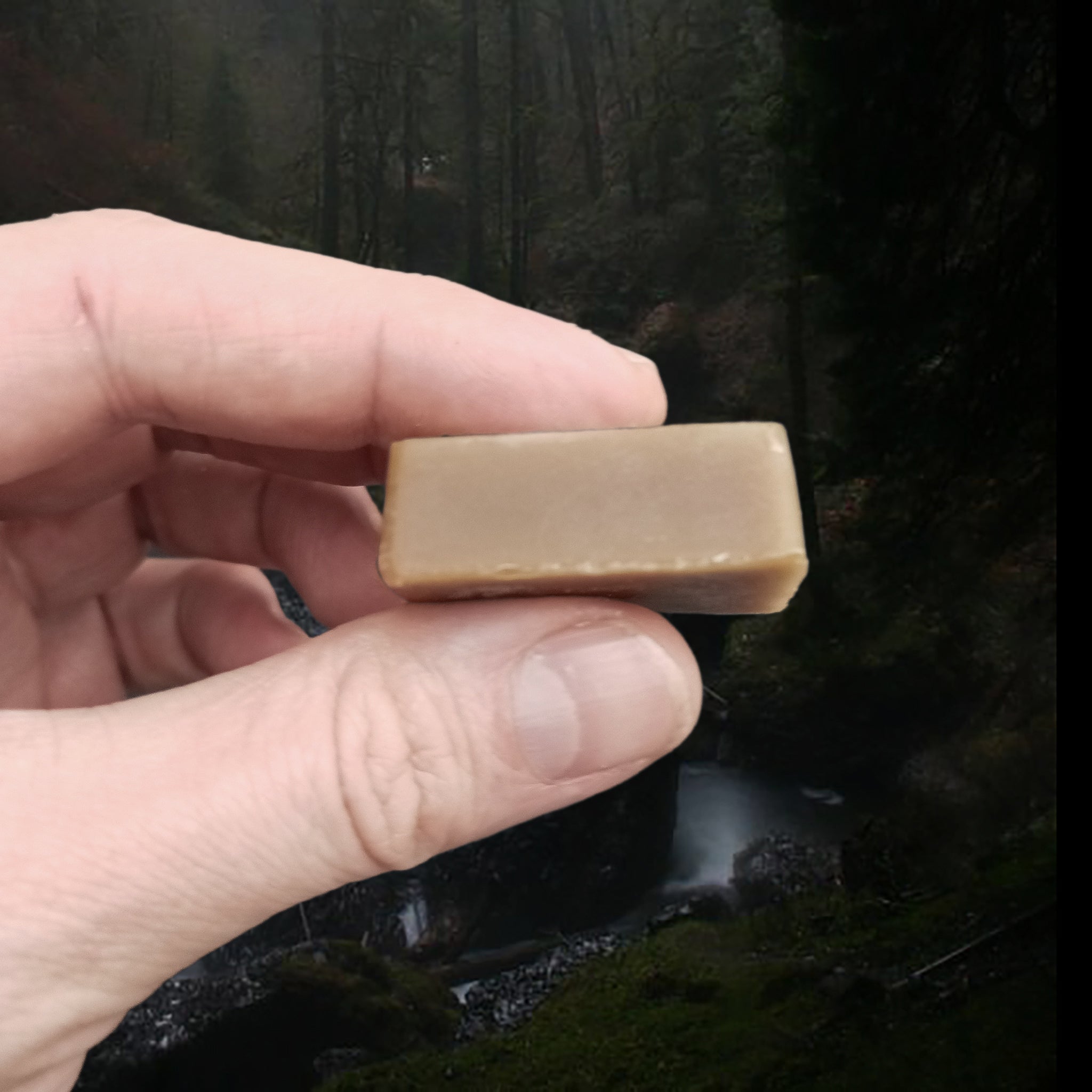 100% Natural Beeswax Cake / Block for Viking Leather Craft in Fingers - Side View