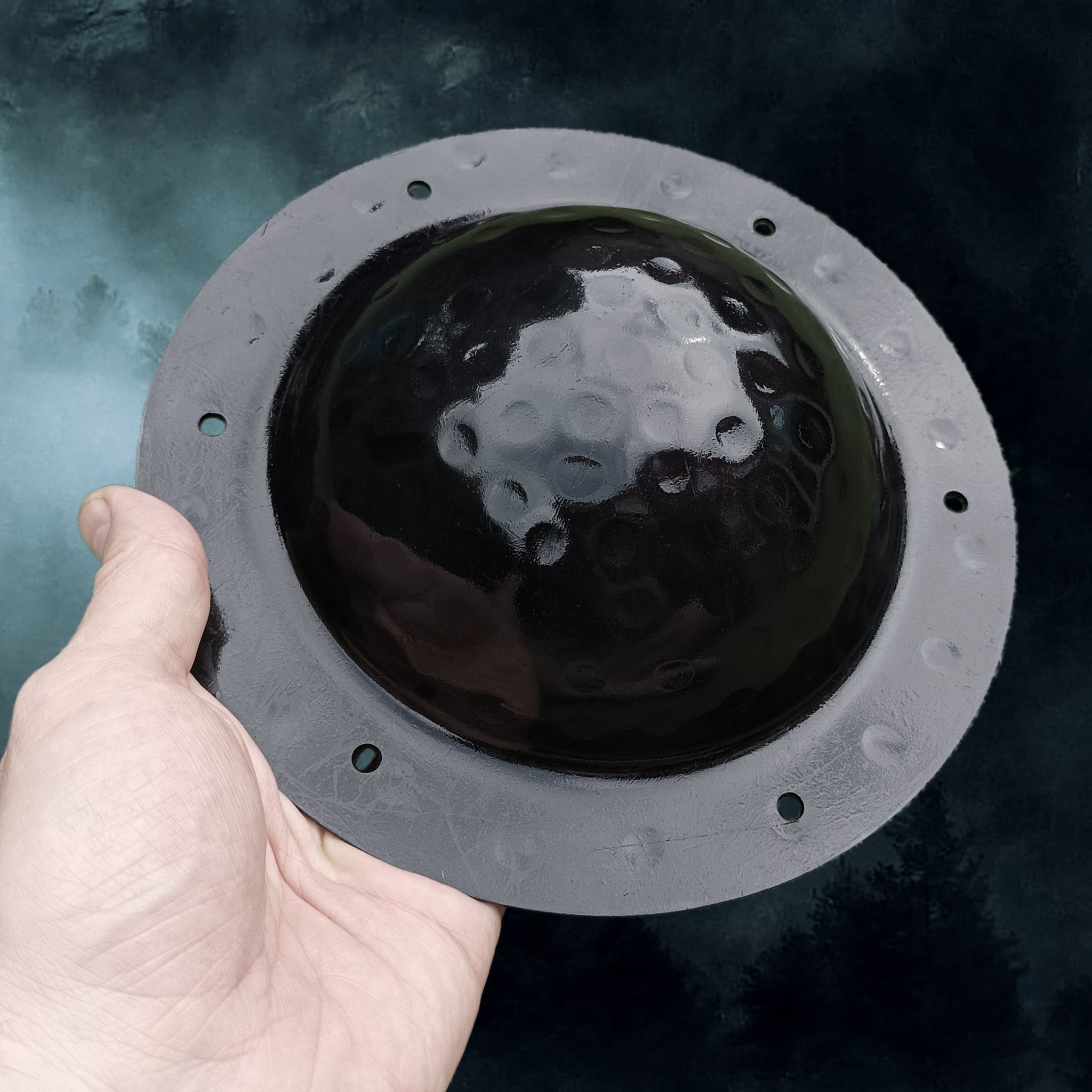 Blackened Domed Viking Shield Boss with Rivet Holes in Hand