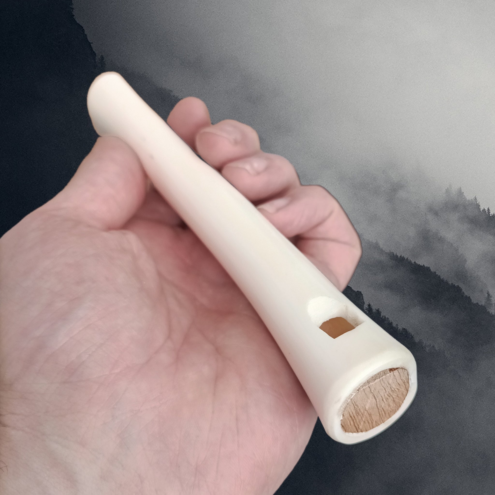 Replica Viking Age Bone Whistle in Hand - Mouth Piece View