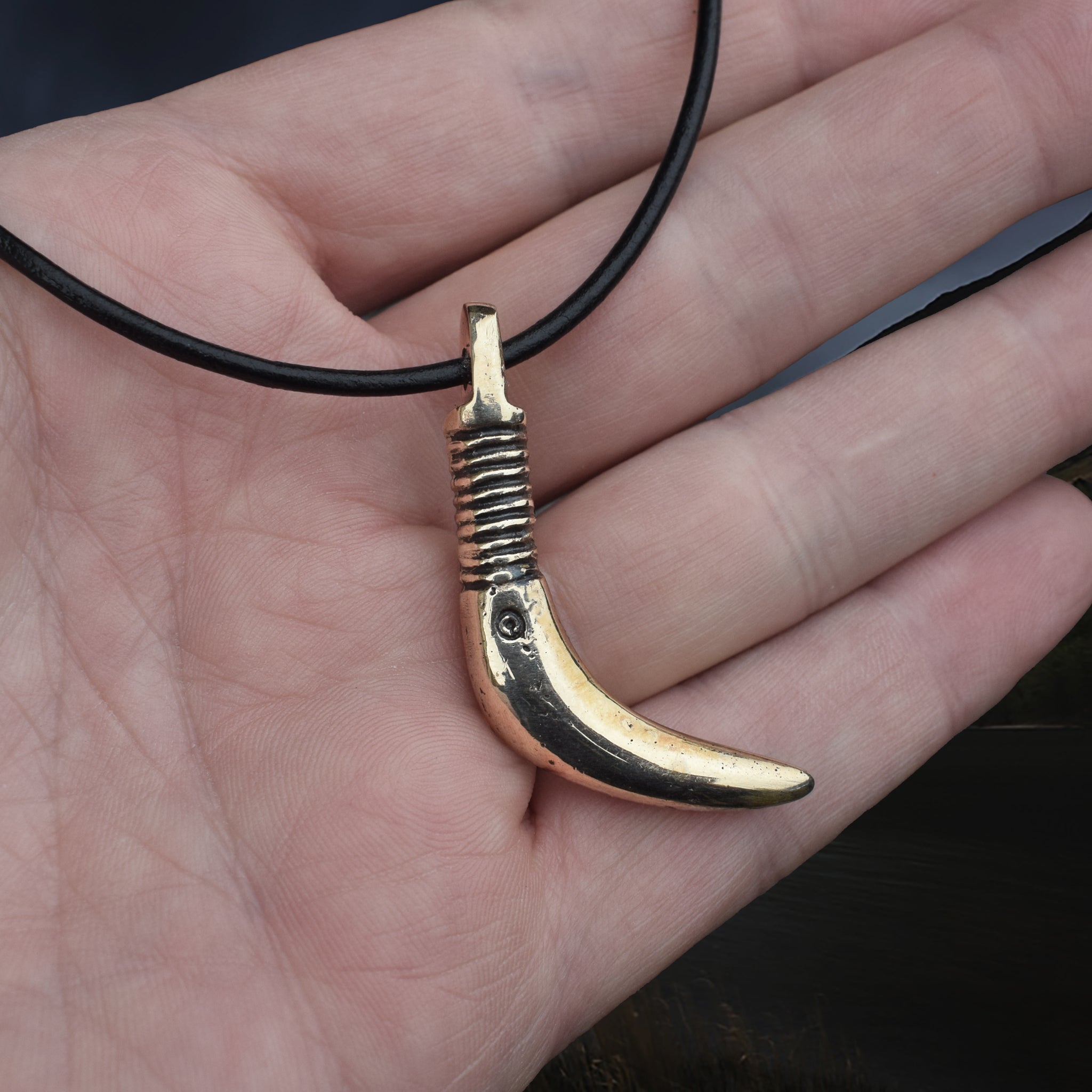Solid Bronze Replica Viking Bear Tooth Pendant from 9th to 11th century Finland on Leather Cord, on Hand