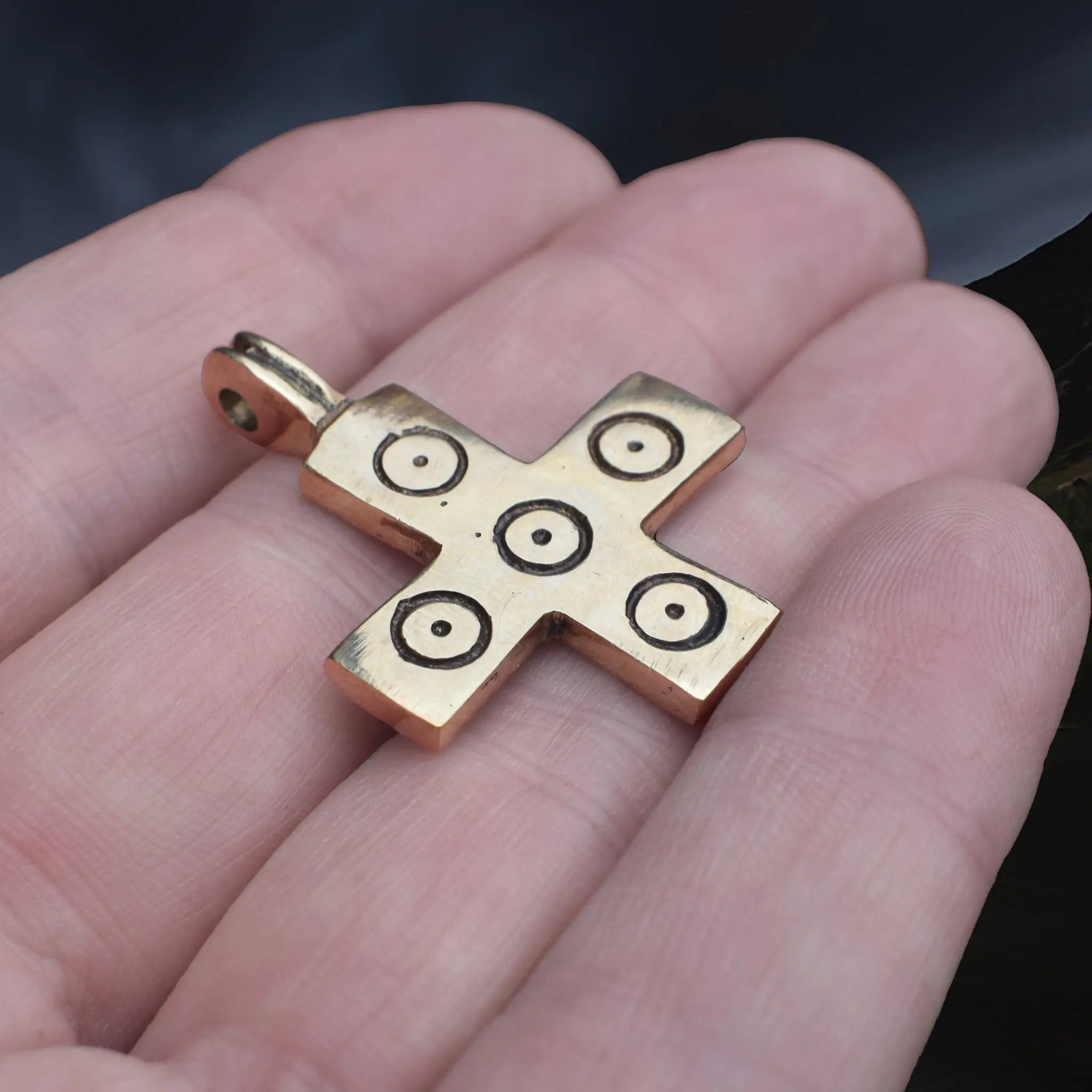 Bronze Replica Viking / Saxon Cross / Crucifix Pendant with 5 Dot Pattern on Hand - Side Angle View