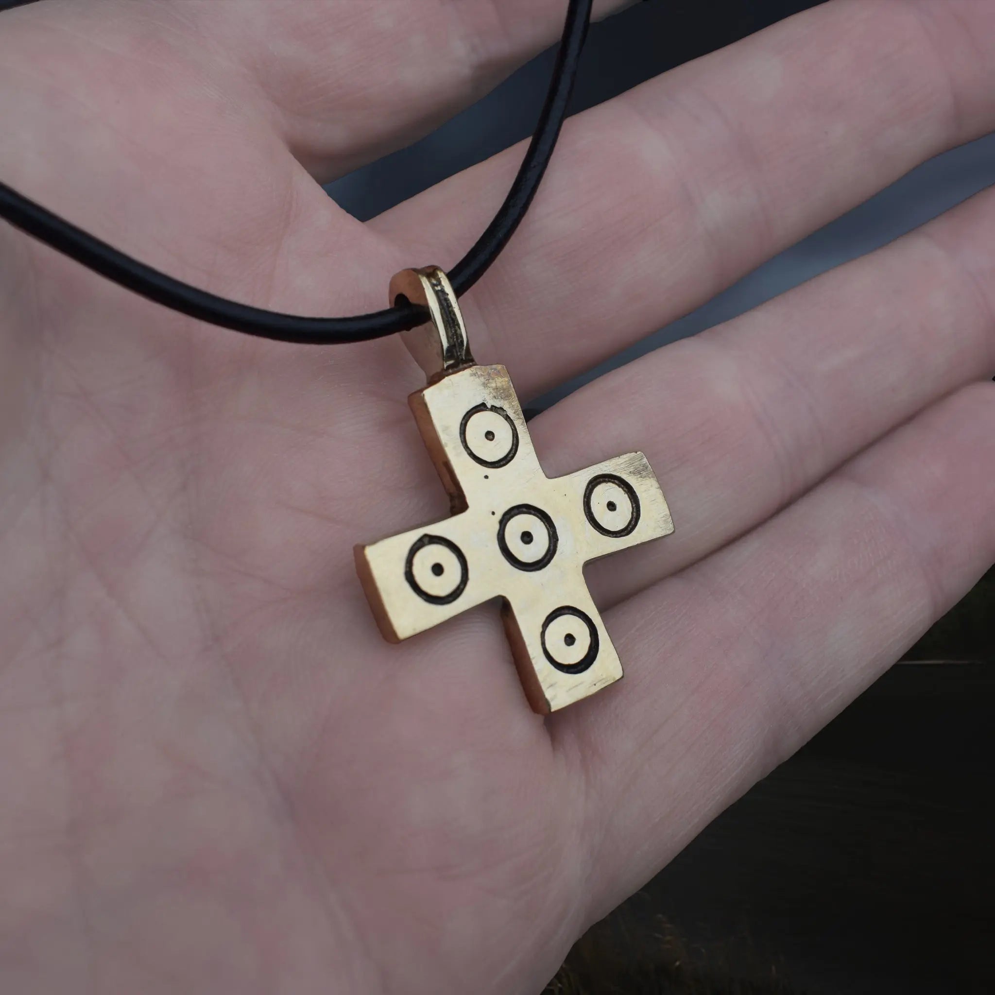 Bronze Replica Viking / Saxon Cross / Crucifix Pendant with 5 Dot Pattern on Leather Cord, On Hand - Angle View