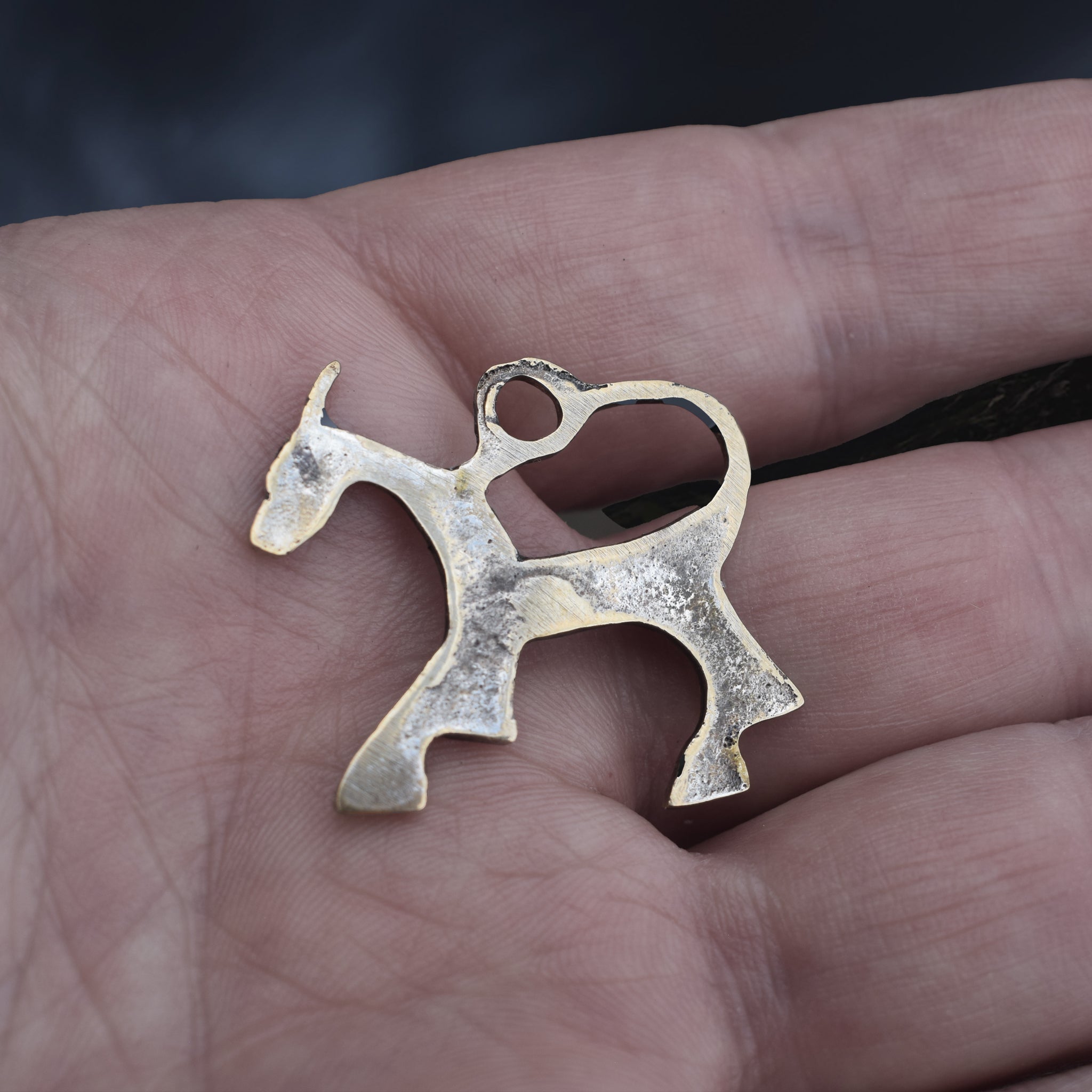 Bronze Replica Viking Horse Pendant from Novgorod on Hand - Back View