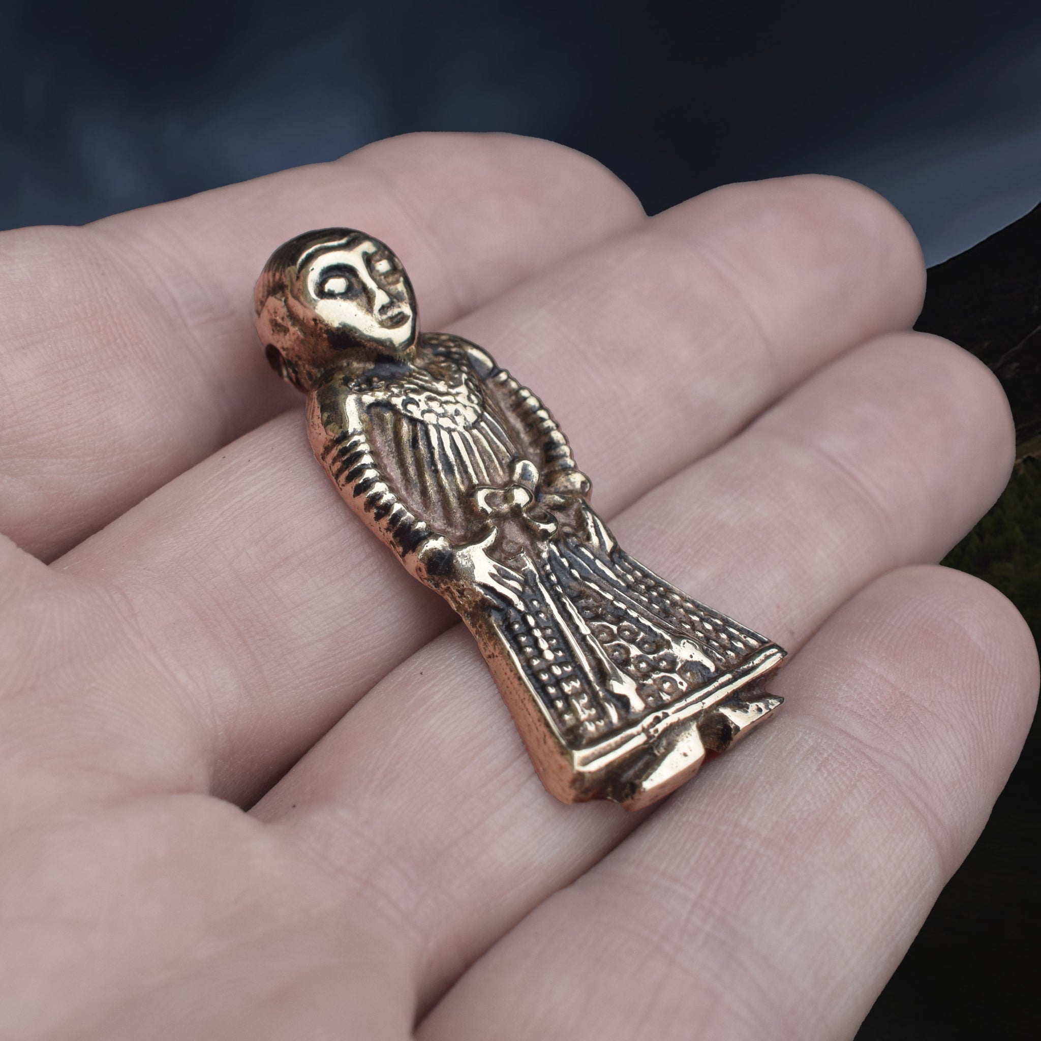 Large Bronze Viking Woman Pendant Replica from Revninge, Denmark on Hand - Front Angle View