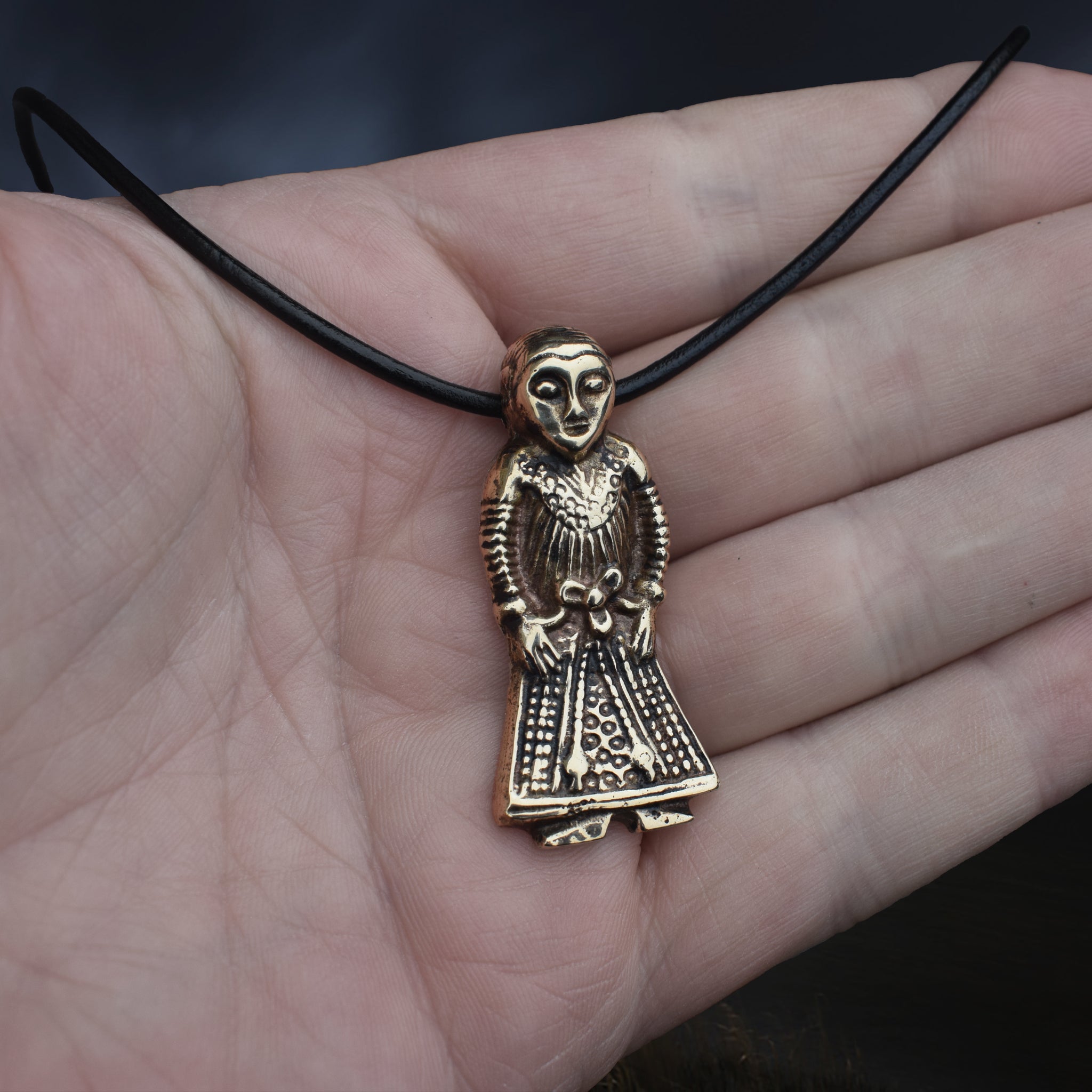 Large Bronze Viking Woman Pendant Replica from Revninge, Denmark on Leather Cord, on Hand