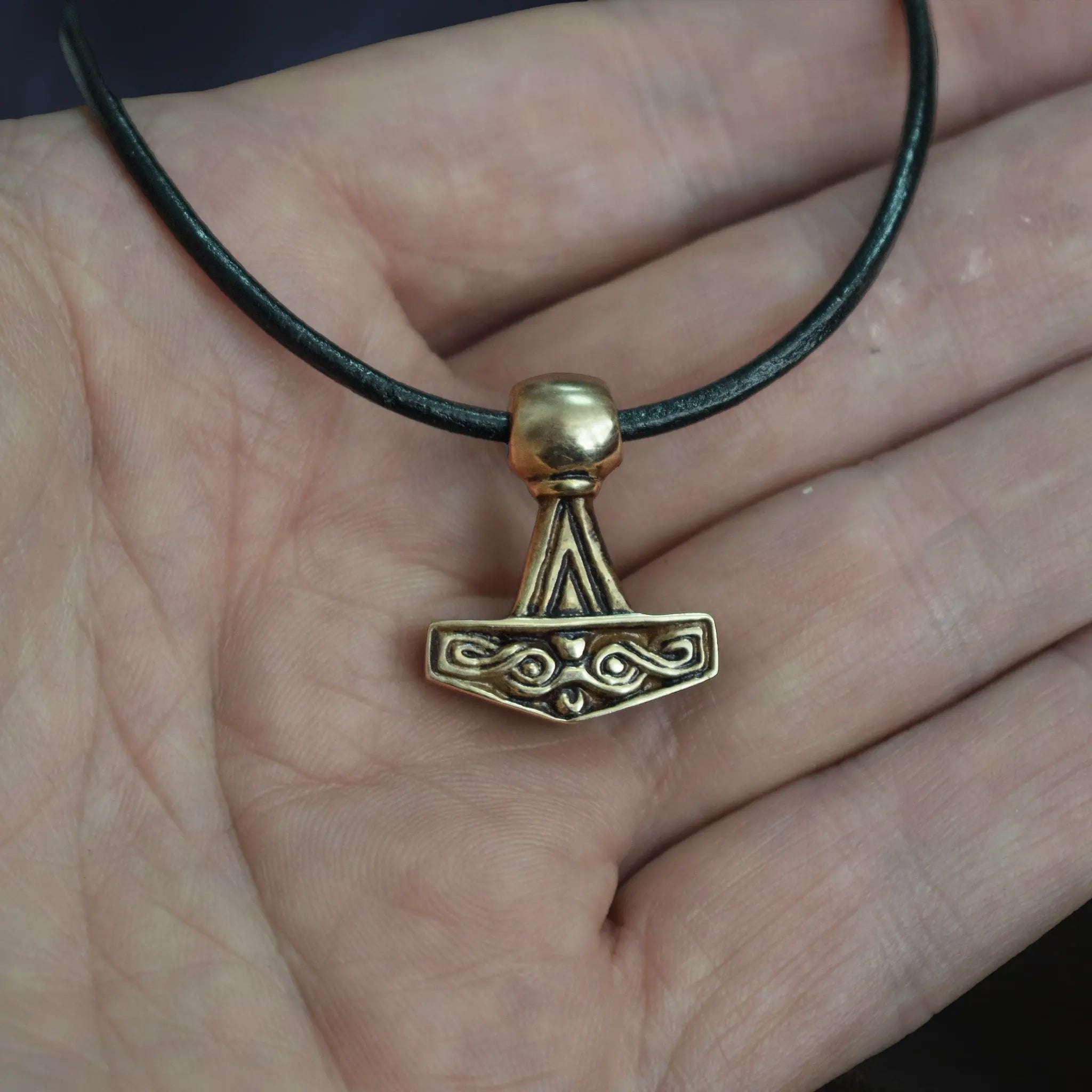 Bronze Runic Thors Hammer Pendant Replica from Lolland, Denmark on Leather Cord, On Leather Cord, On Hand - Face View