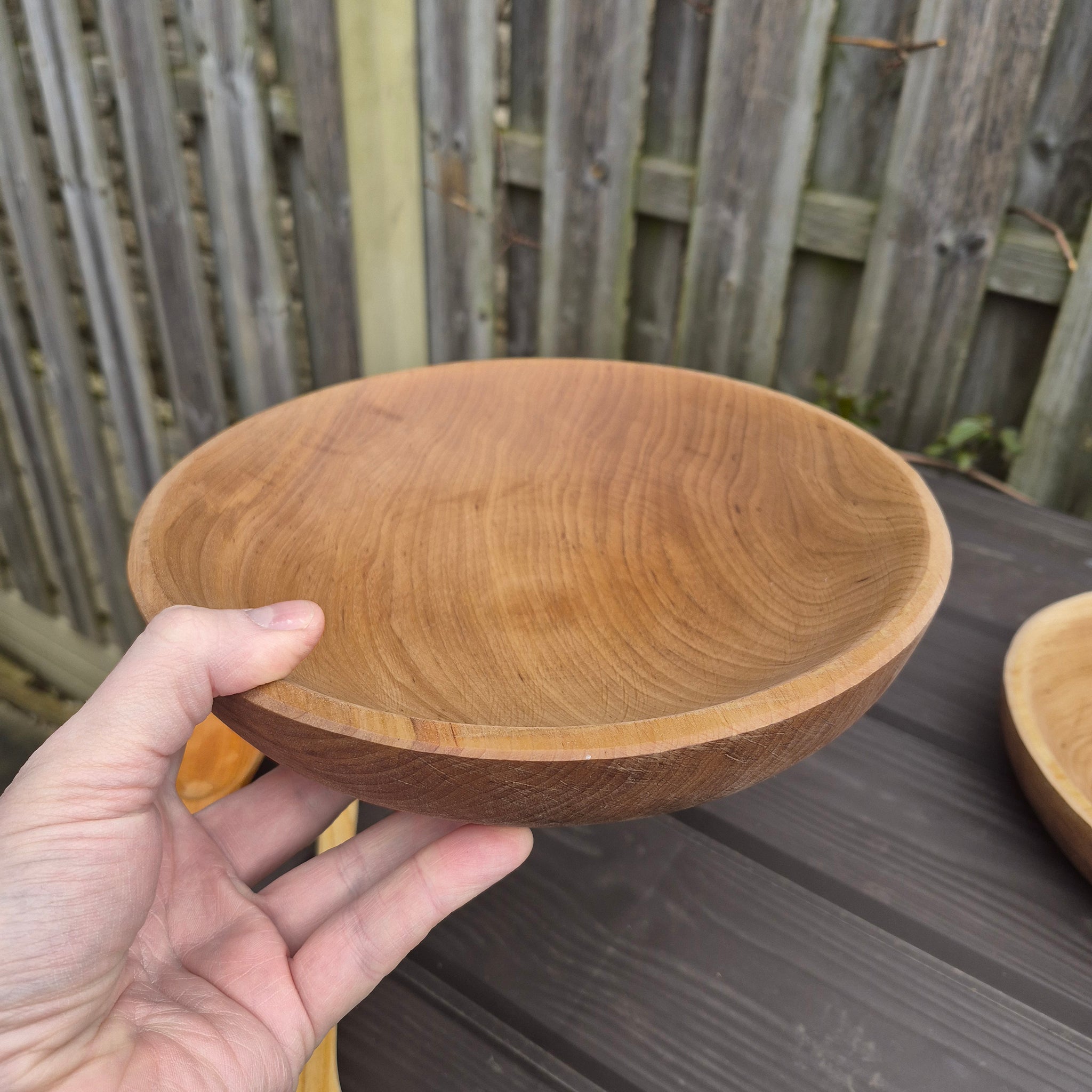 Viking Age Replica Hand Turned Alder Wood Bowl - Large Size in Hand - Side Angle View from The Viking Dragon