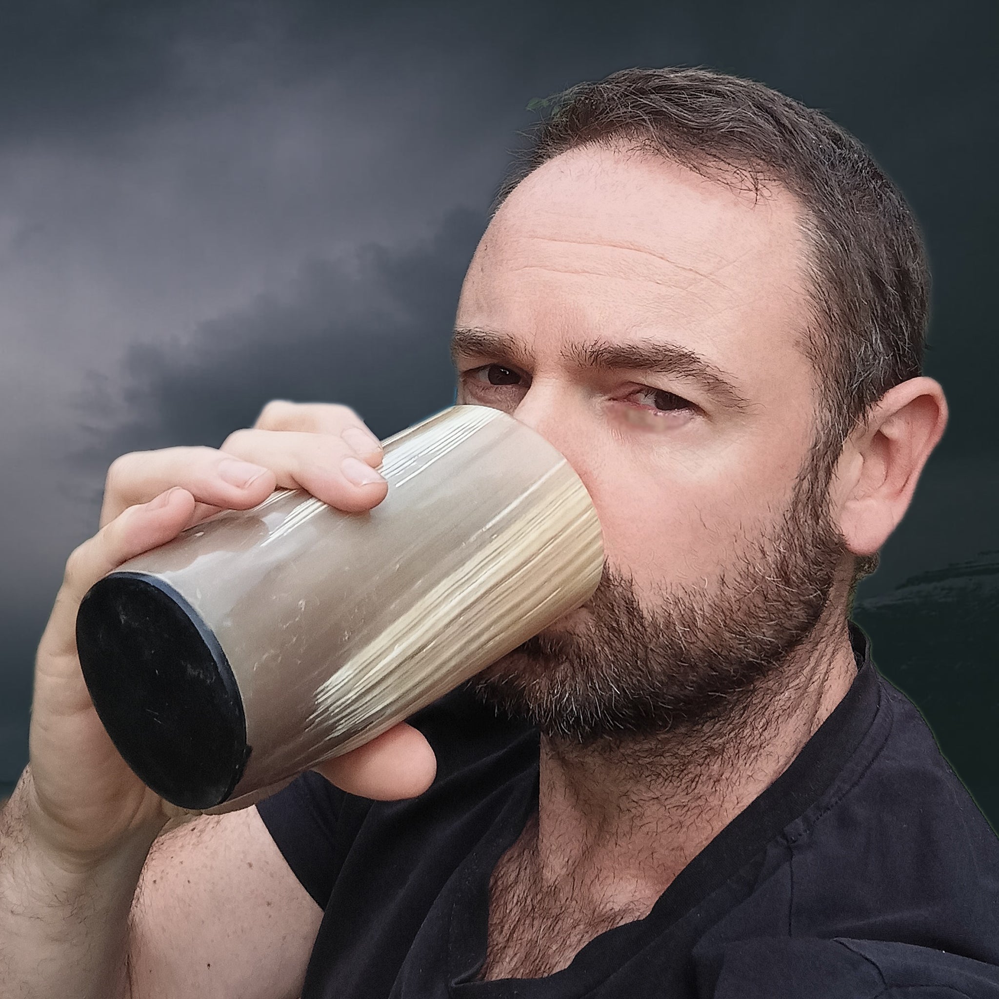 Drinking from a Polished Horn Beer Beaker with Resin Base