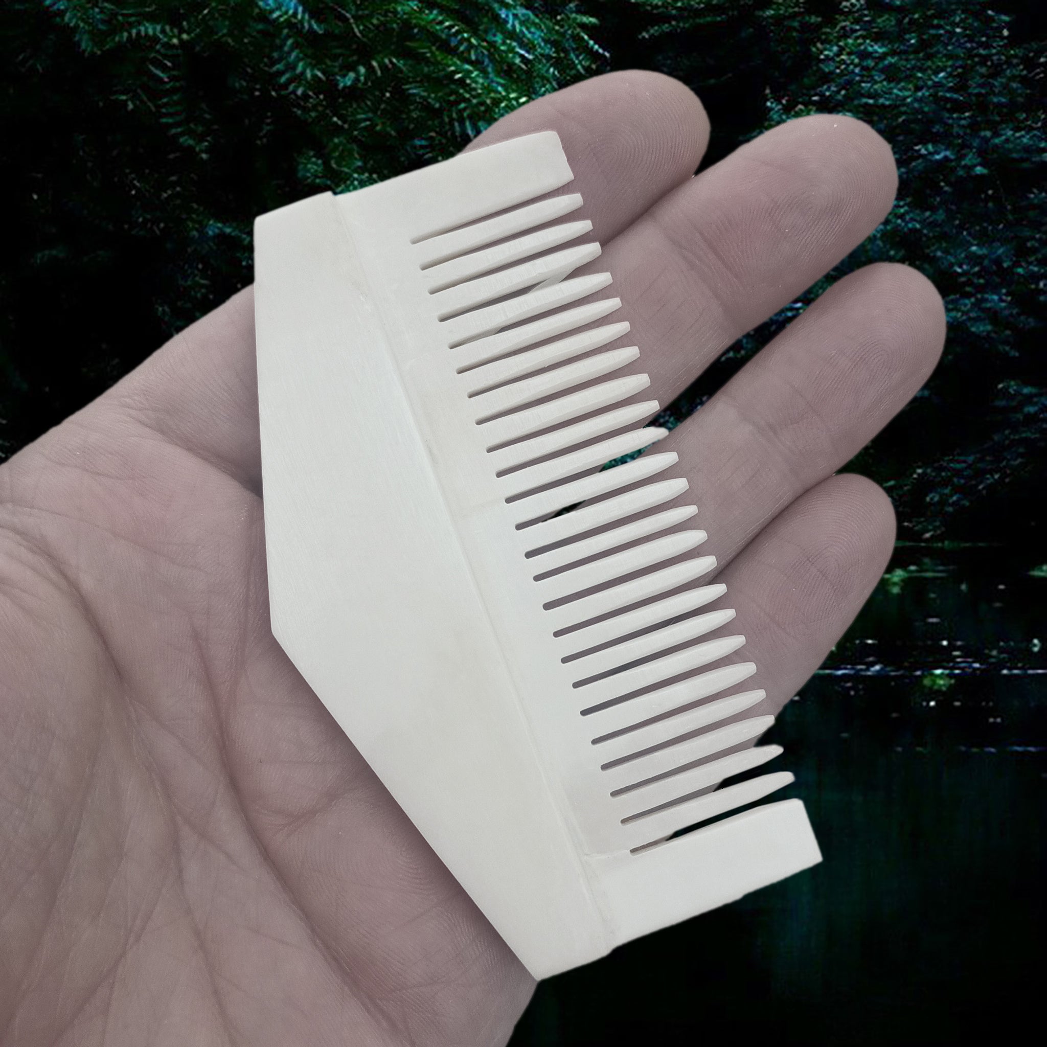 Authentic Handmade Replica Viking Bone Comb in a Triangular Shape on Hand