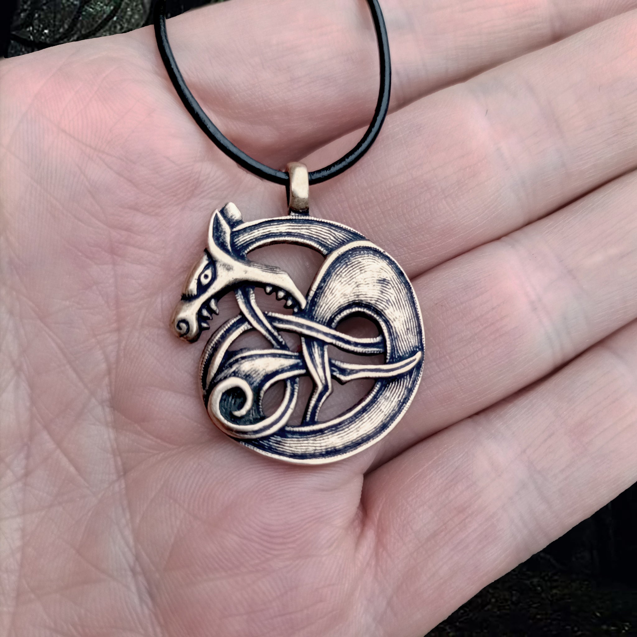 Bronze Fenrir Viking Wolf Pendant on Hand - Viking Jewelry