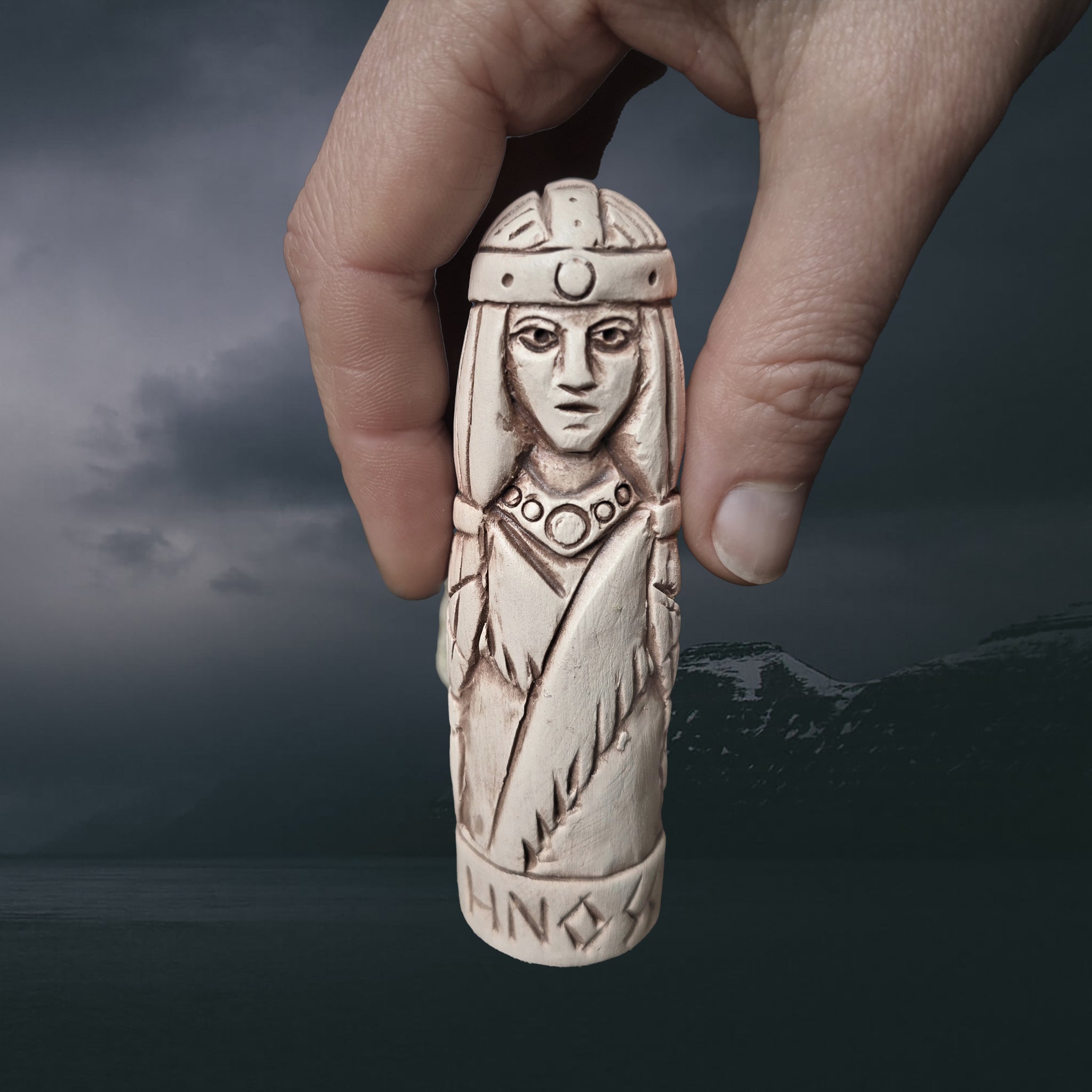 Statuette of the Norse Goddess Hnoss in Hand-Crafted Clay with Hand for Scale