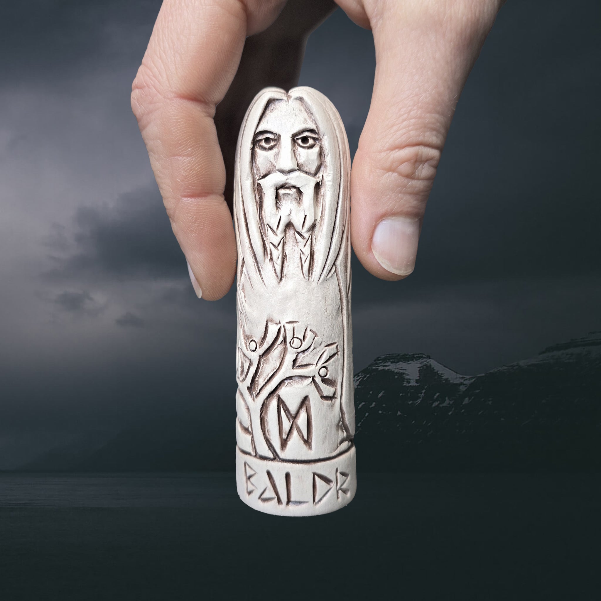 Statuette of the Norse God Baldr in Hand-Crafted Clay in Fingers for Scale