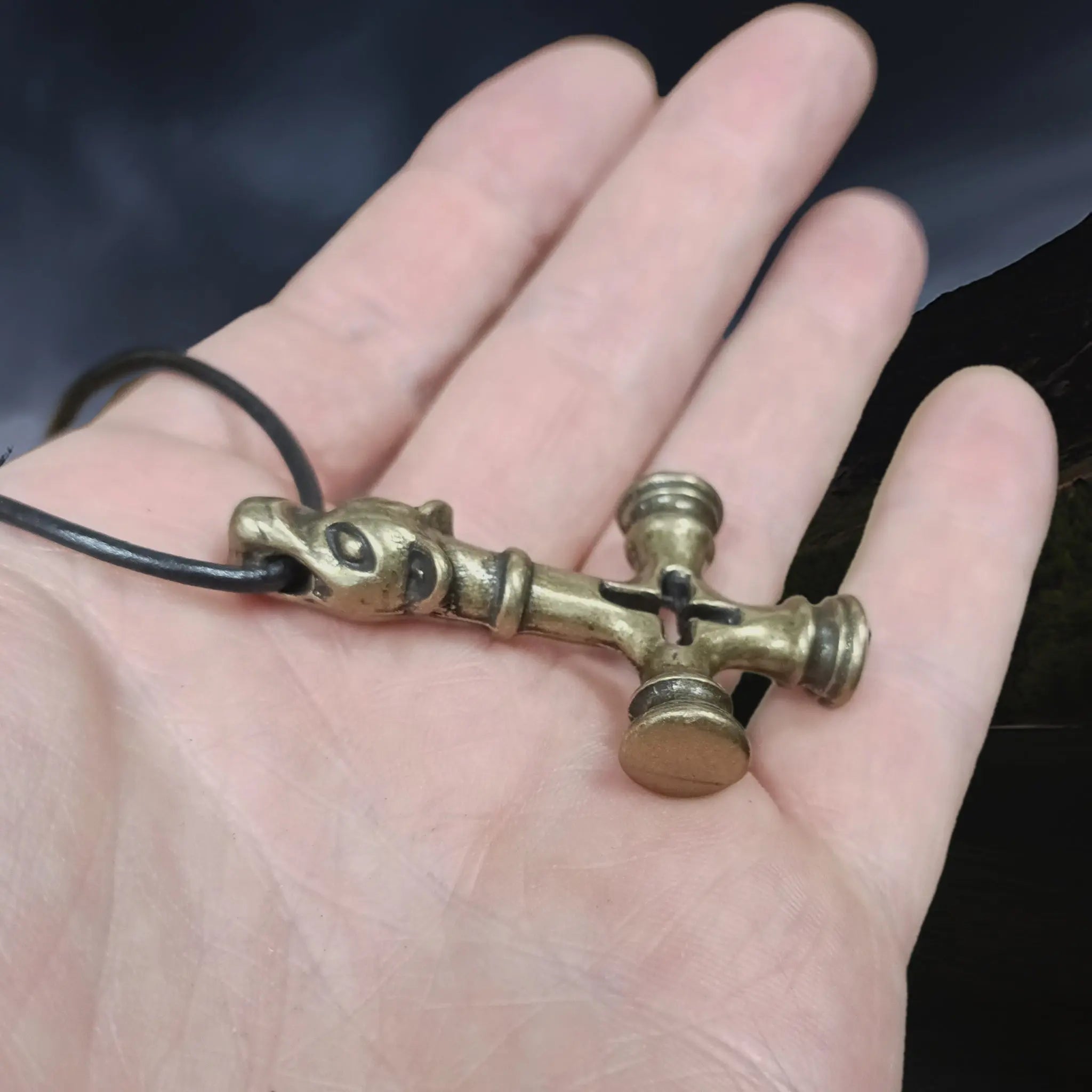 Large Brass Replica of the Original Icelandic Thor's Hammer Cross Pendant, from Foss, Iceland - 11th Century on Leather Cord on Hand - Side View