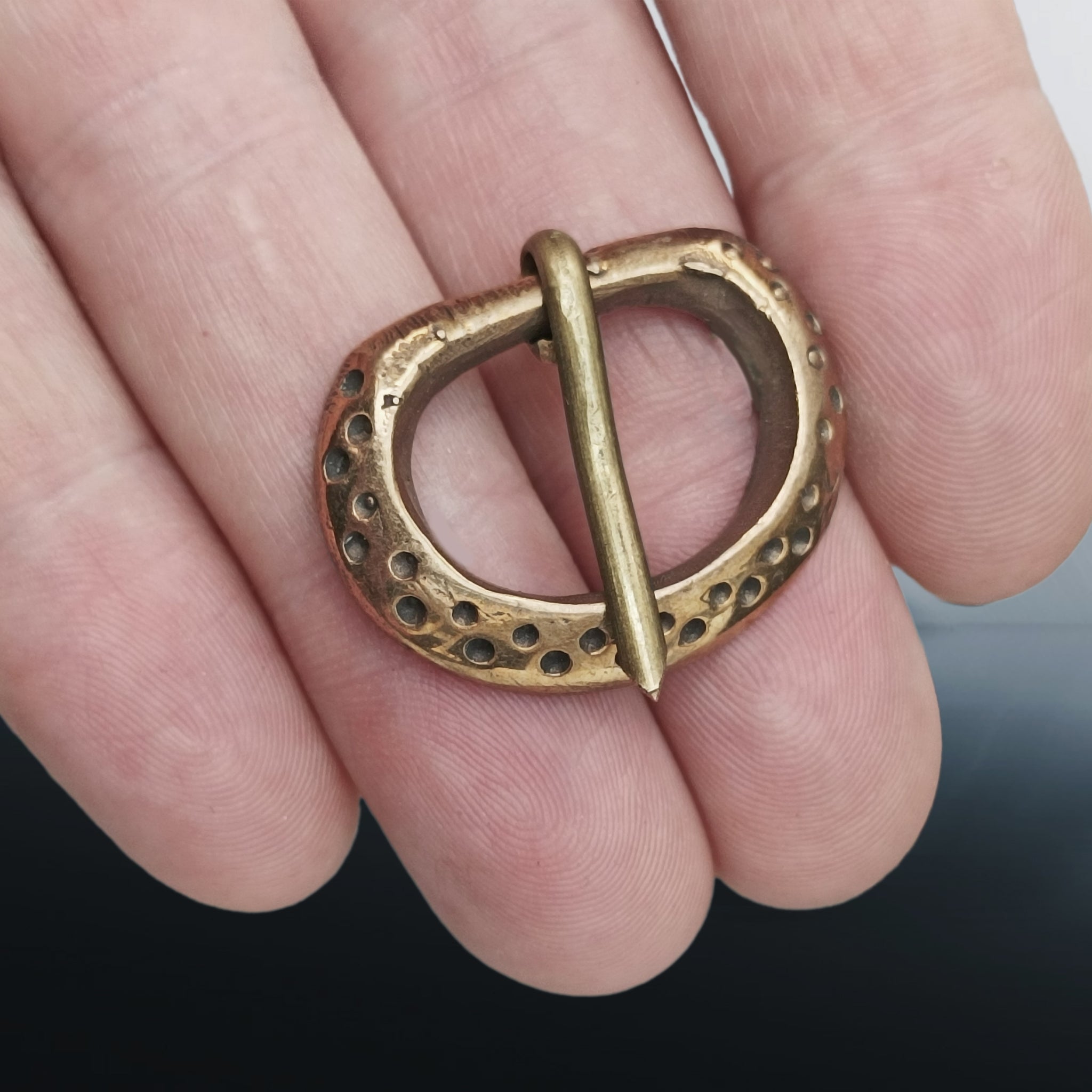 10th - 11th Century Small Replica Saxon Bronze Buckle with Dot Design on Hand