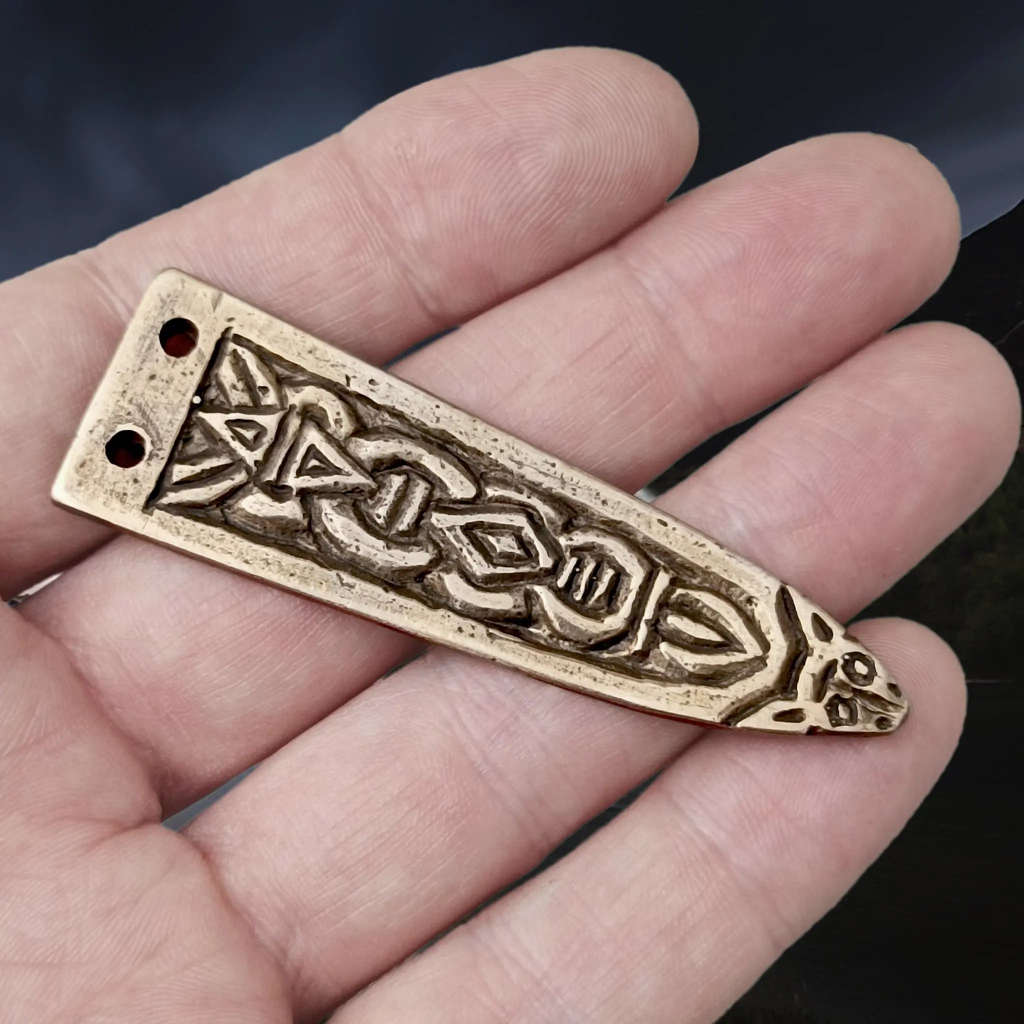 Bronze Viking Strap End with Animal Head from Sweden on Hand