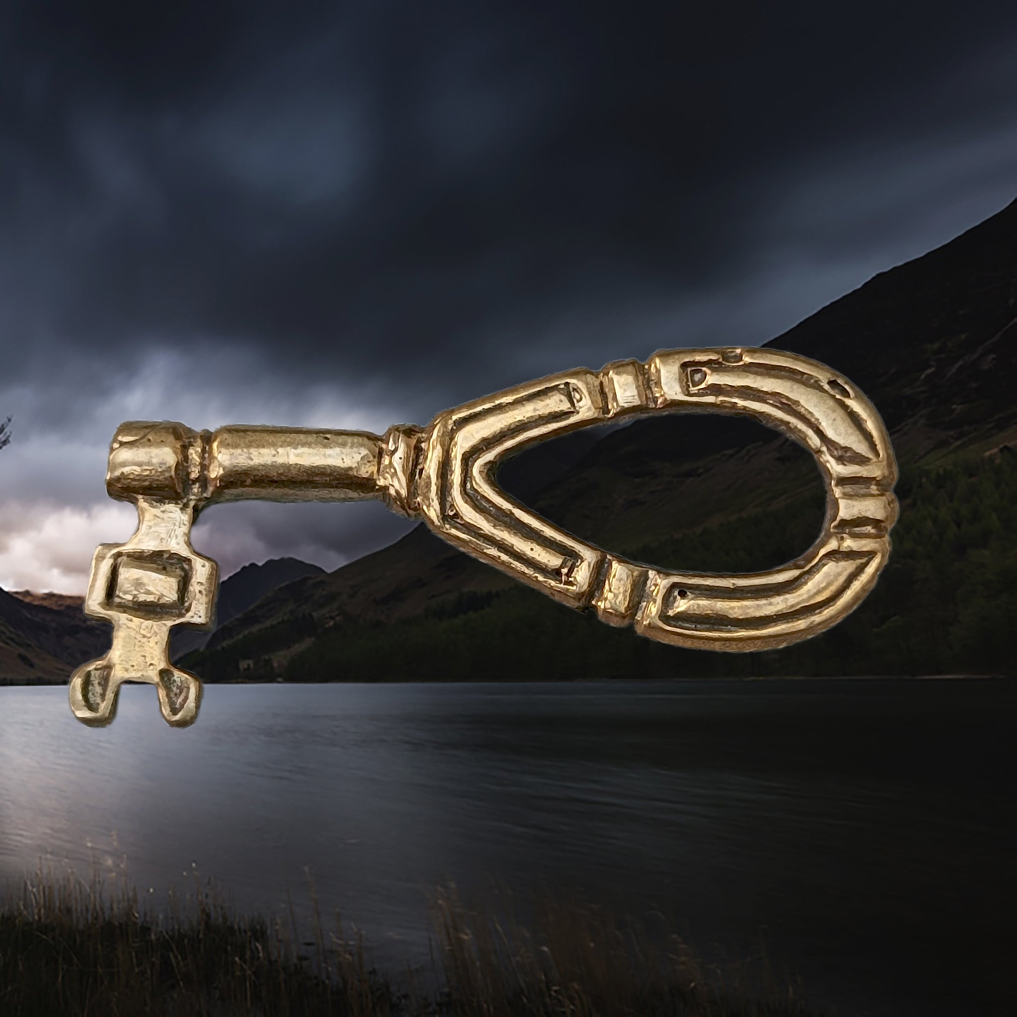 Large round Viking key with decorated design from Sweden- Side View