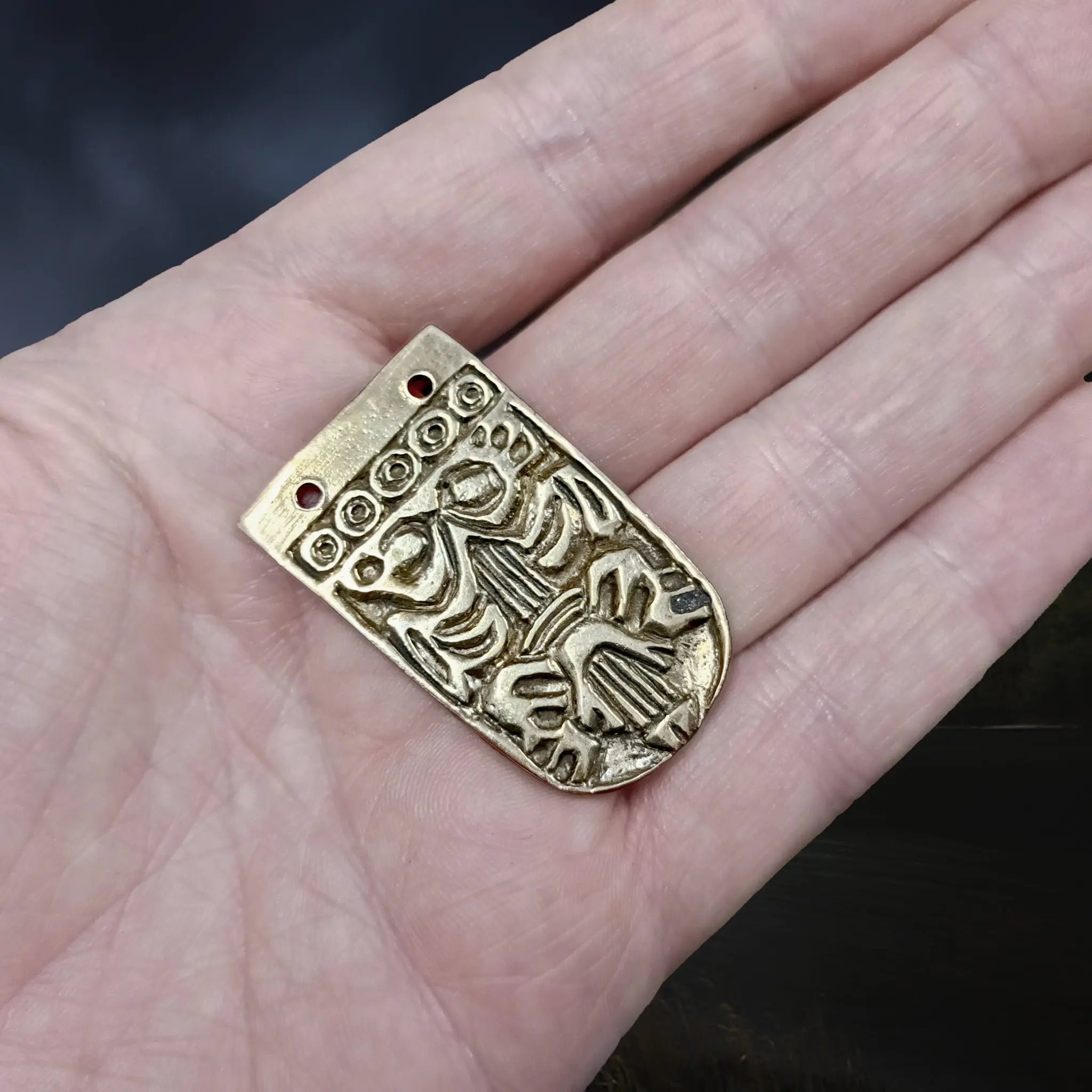 Replica Viking Strap End, 9 - 10th century in Borre Style, based on a find from Aldeby, Norfolk, England, UK on Hand