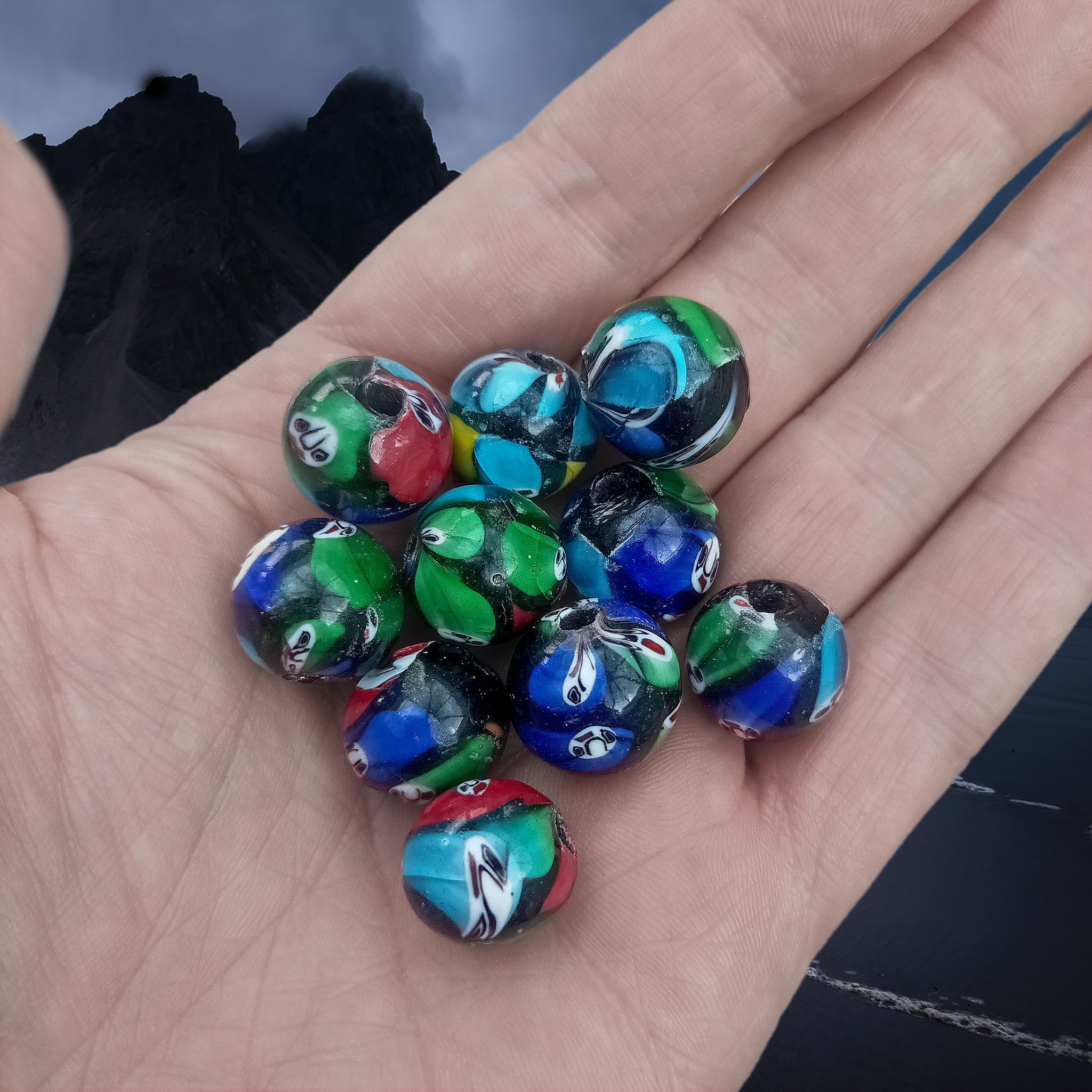 Hand-Painted Glass Replica Viking Beads from Birka on Hand x 10