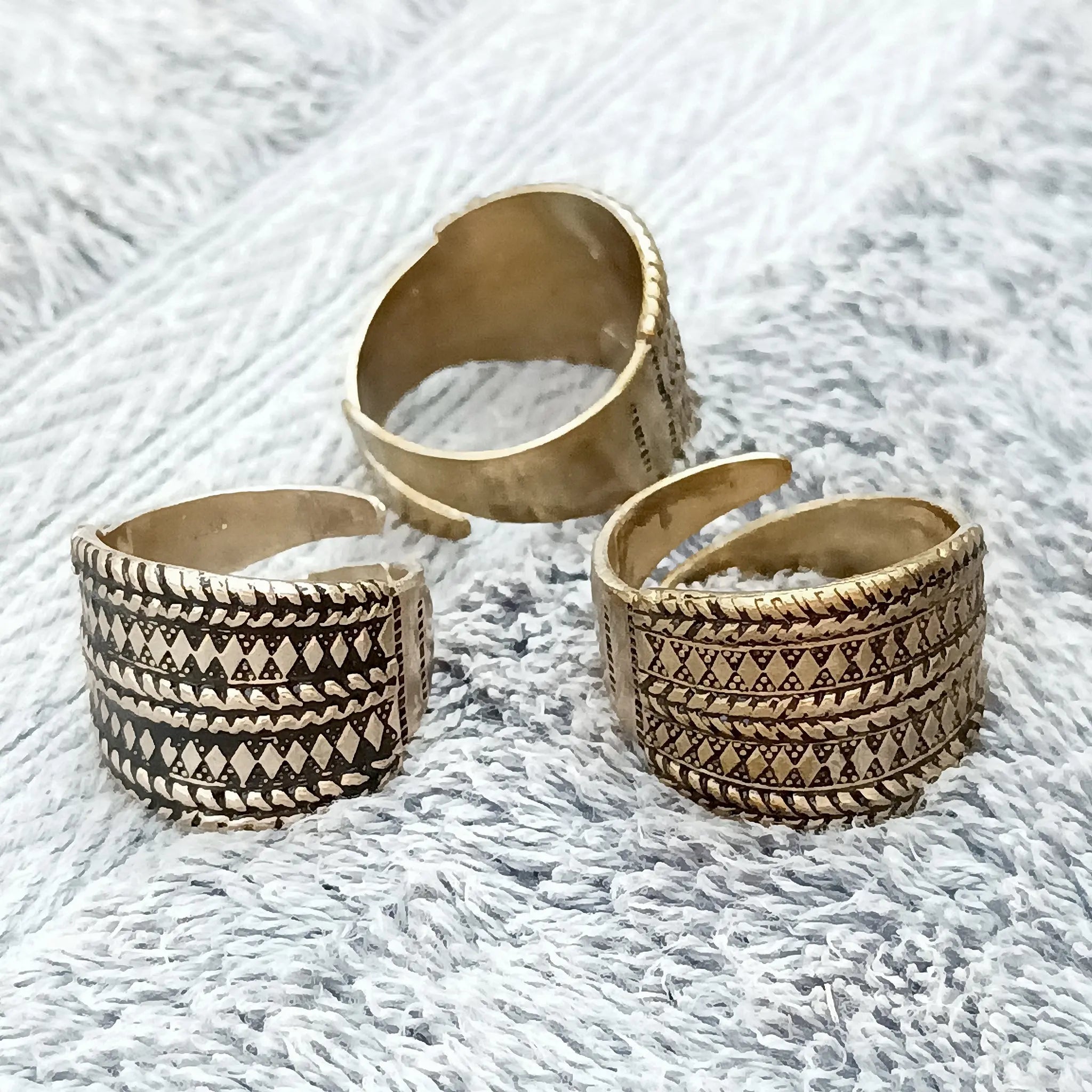 Bronze Replica Ring with Decorated Viking Designs on Cloth