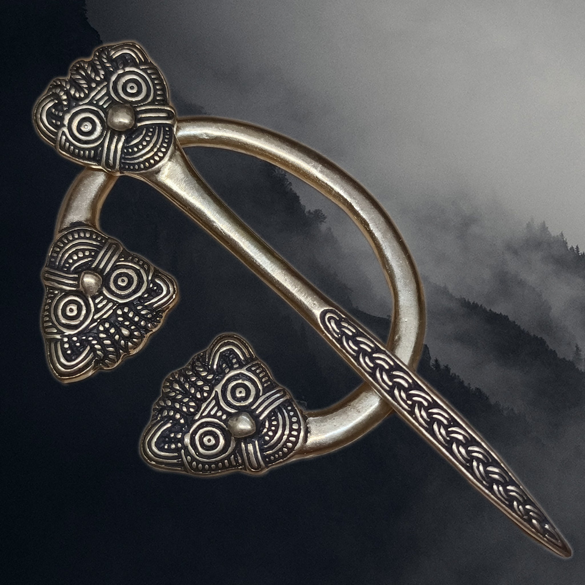 Bronze Danish Penannular Brooch with Viking Heads