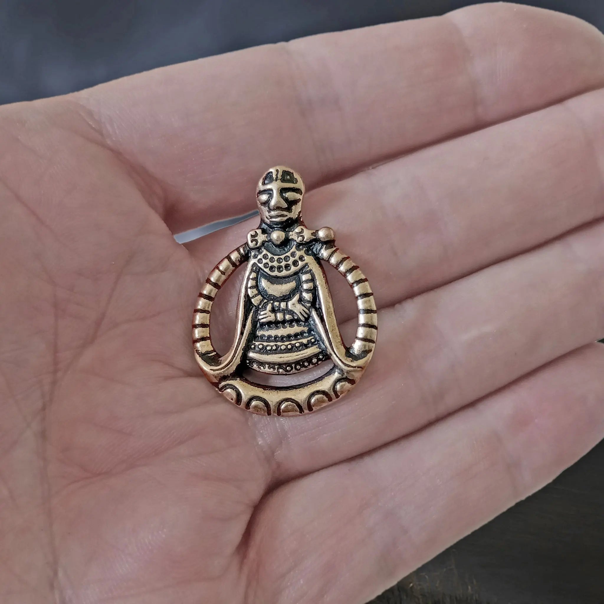 Large Bronze Circular Freya Pendant on Hand