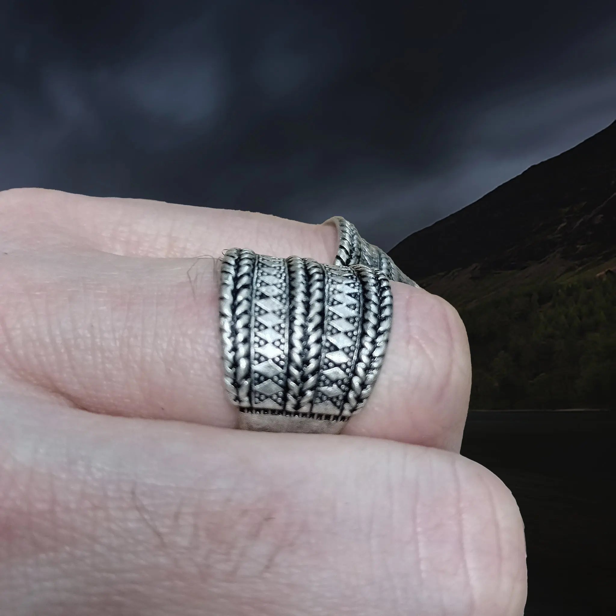 Silver Plated Replica Ring with Decorated Viking Design on Fingers - Side View